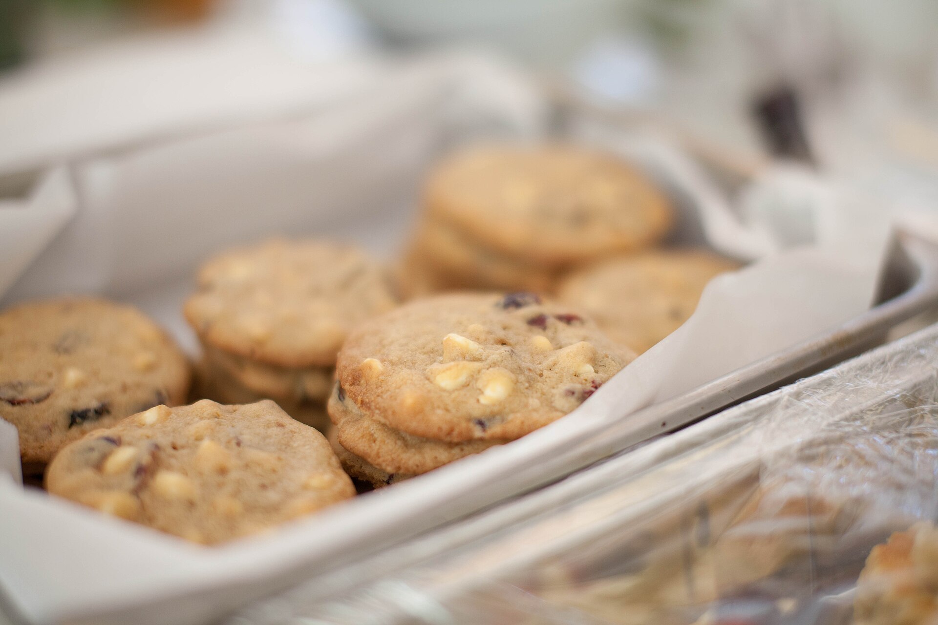 Cranberry and white chocolate treats on parchment