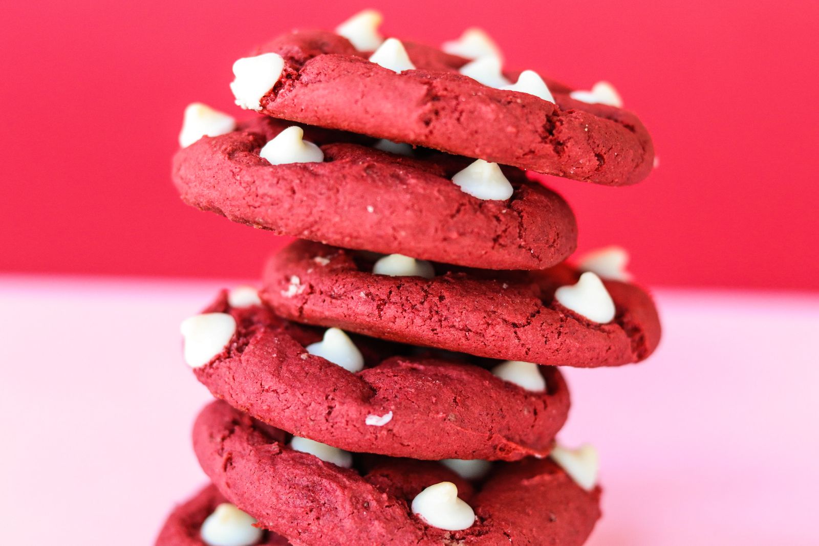 Cheesecake cookies: stacks of soft red velvet cookies