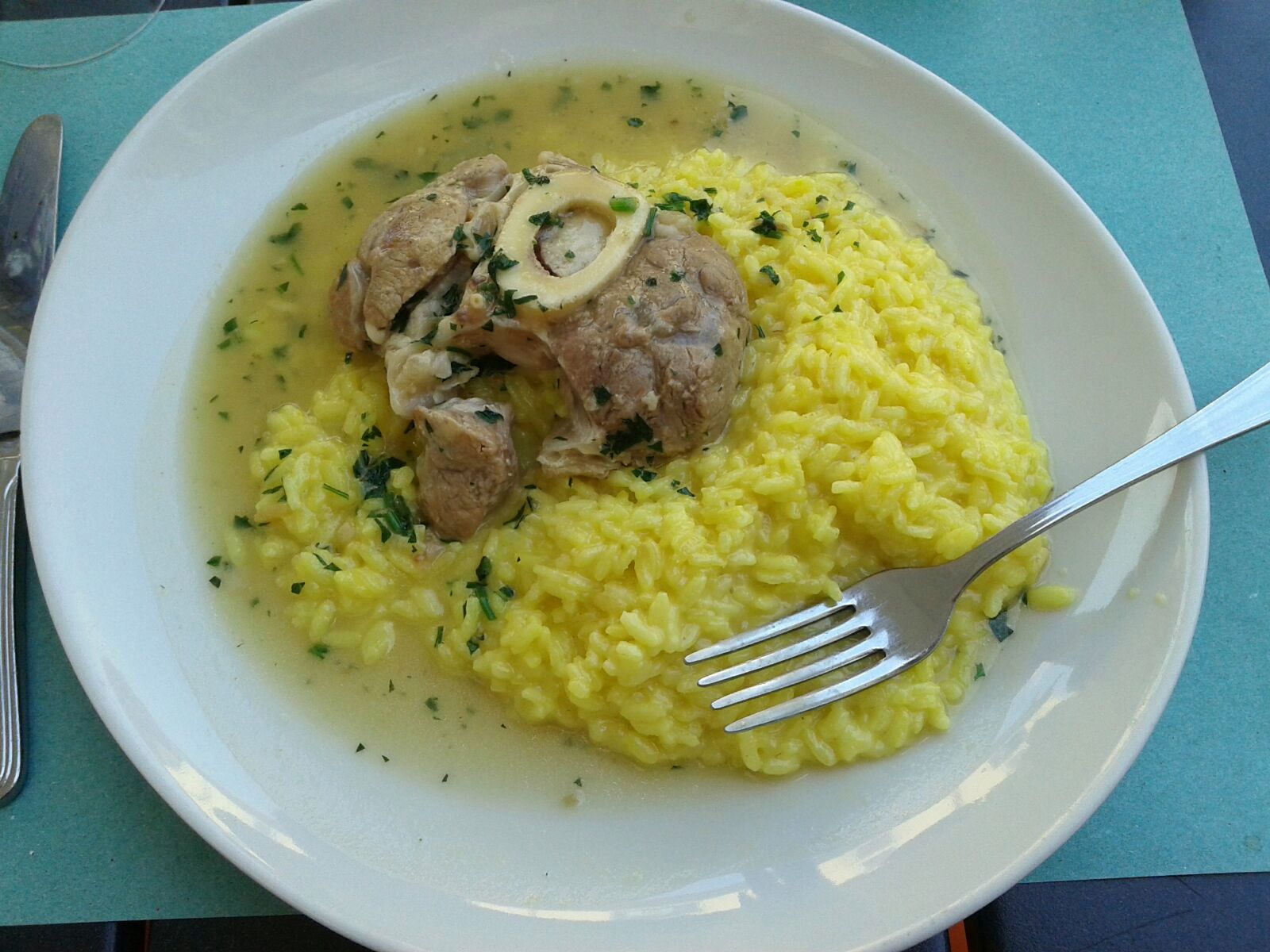 Ossobuco braised veal shank served over saffron risotto