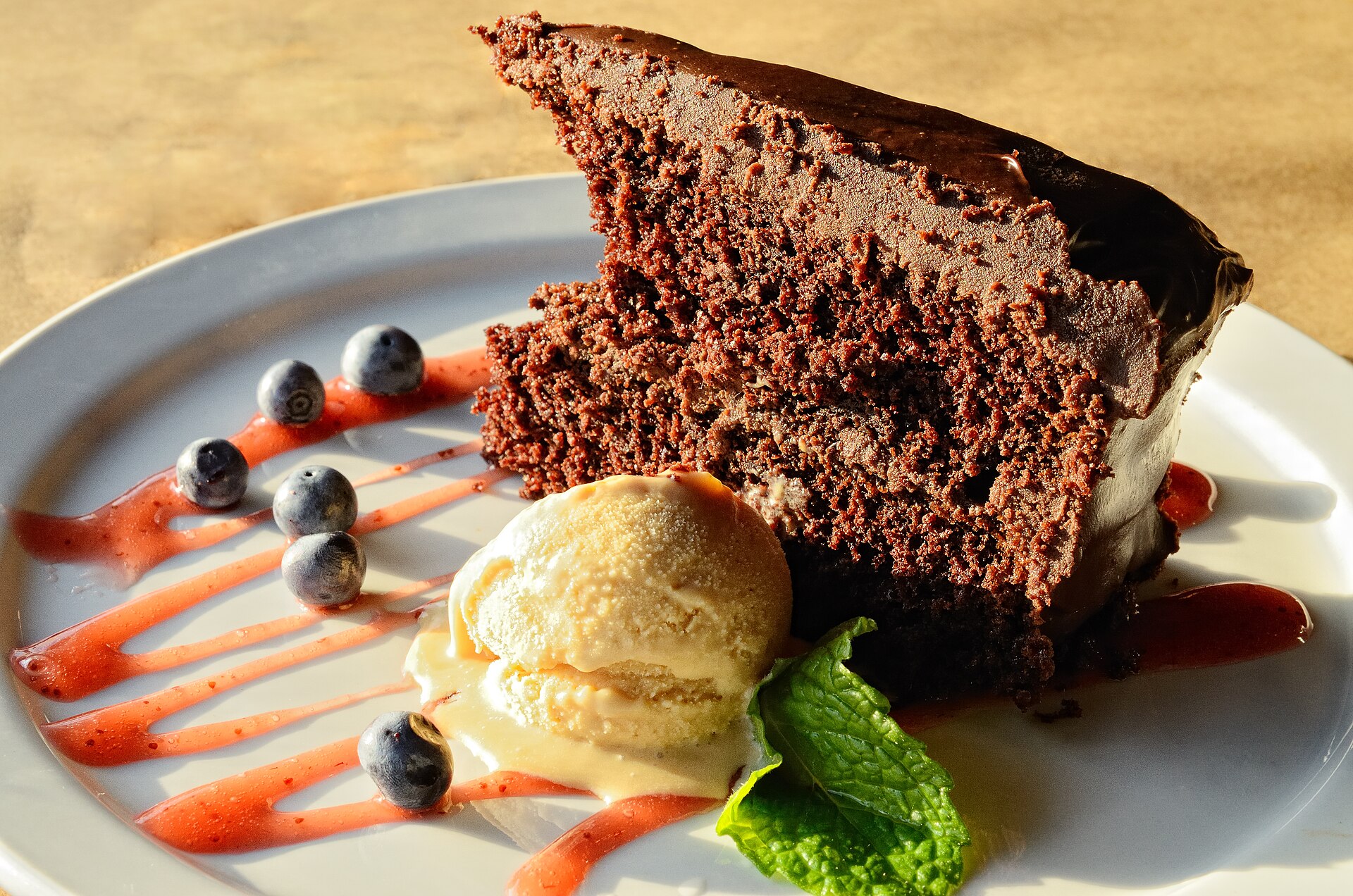Slice of moist chocolate cake on a plate