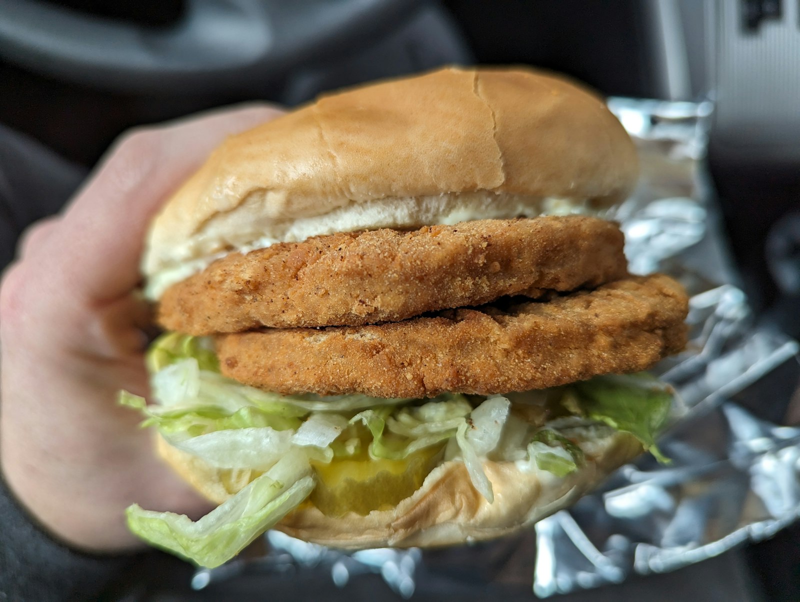 Crispy fish sandwich with lettuce and tartar sauce