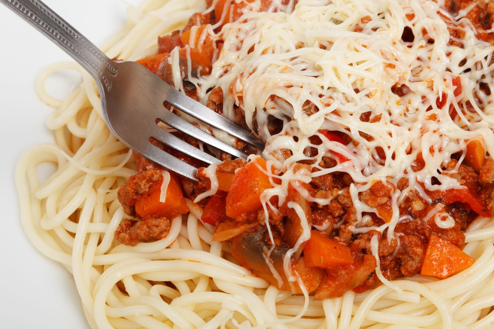Spaghetti with meat sauce and grated cheese