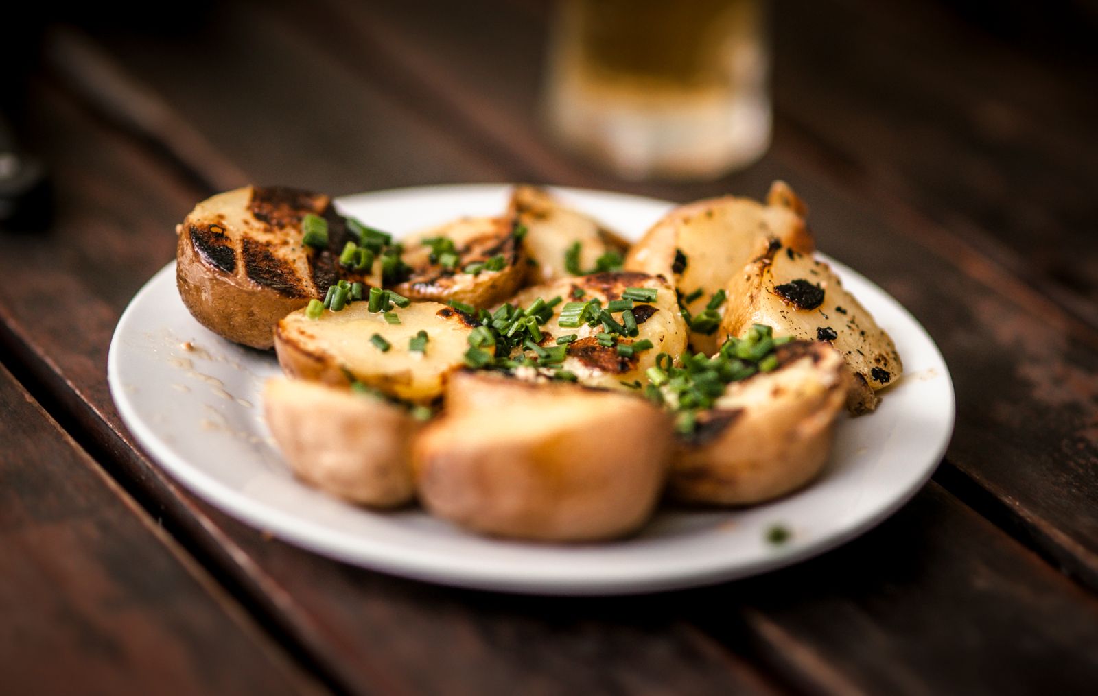 Crispy smashed spuds with herbs