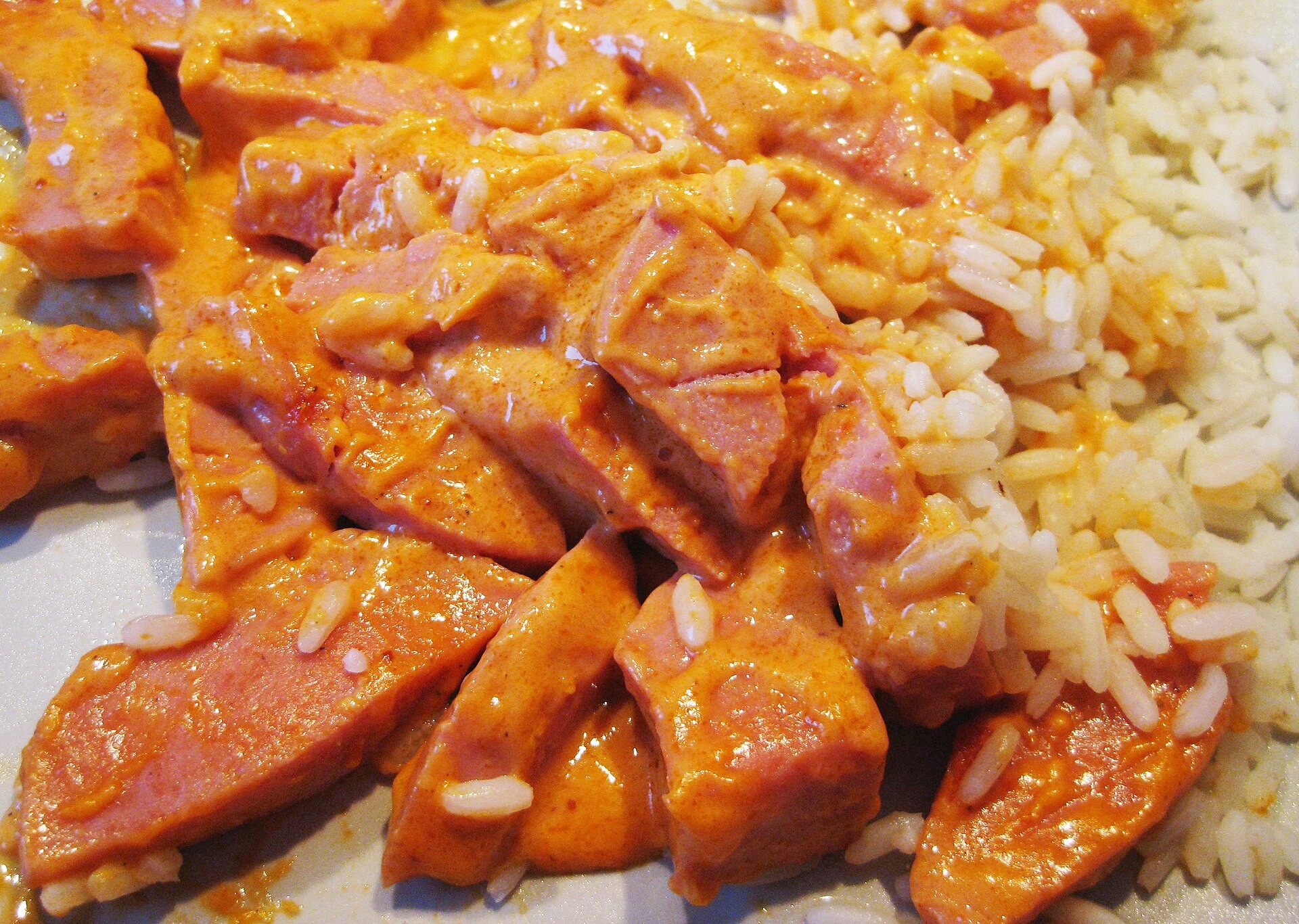 Swedish korv stroganoff, sausage in creamy tomato sauce with rice