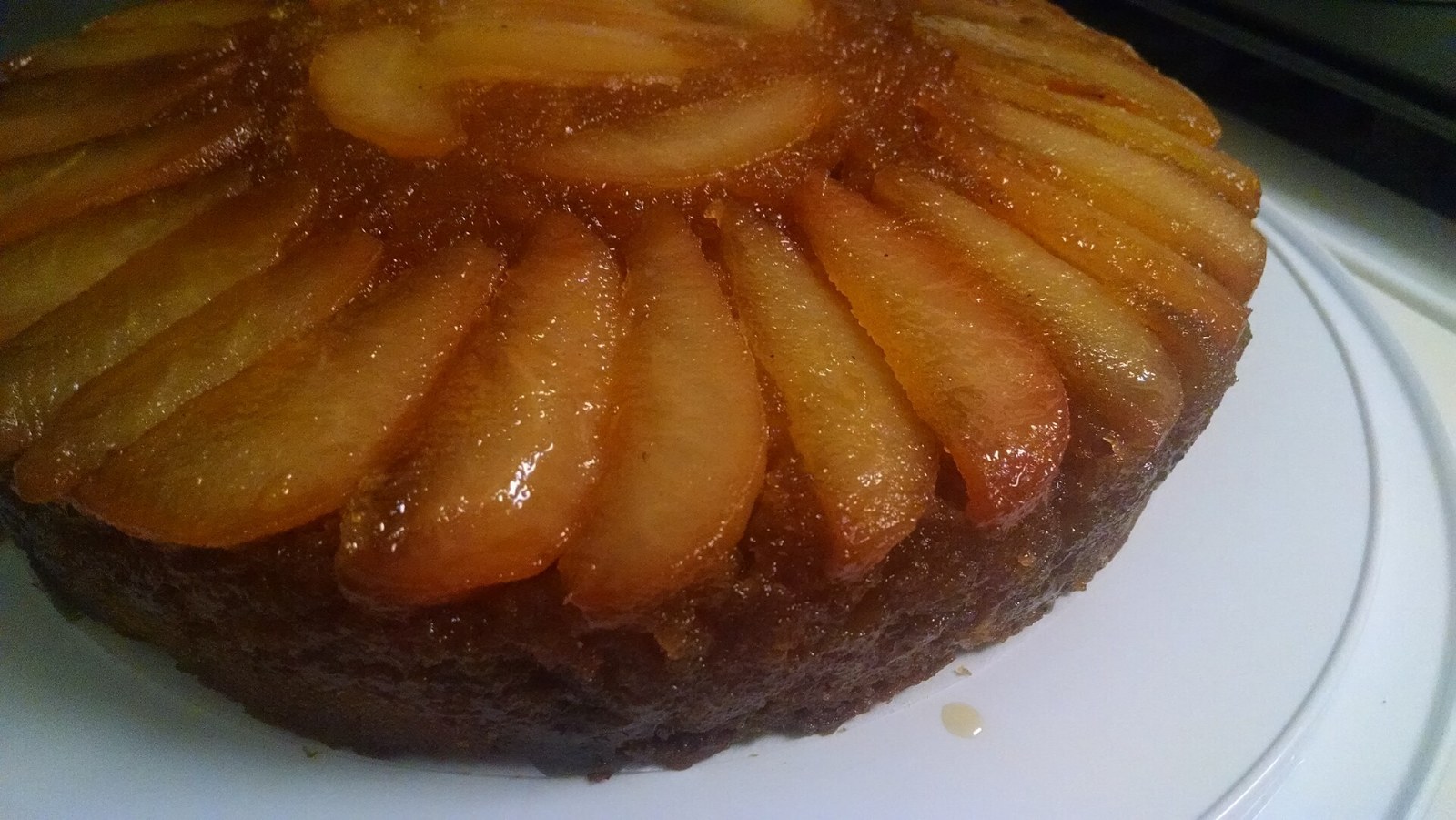 Pear upside down cake with glossy caramelized pear slices