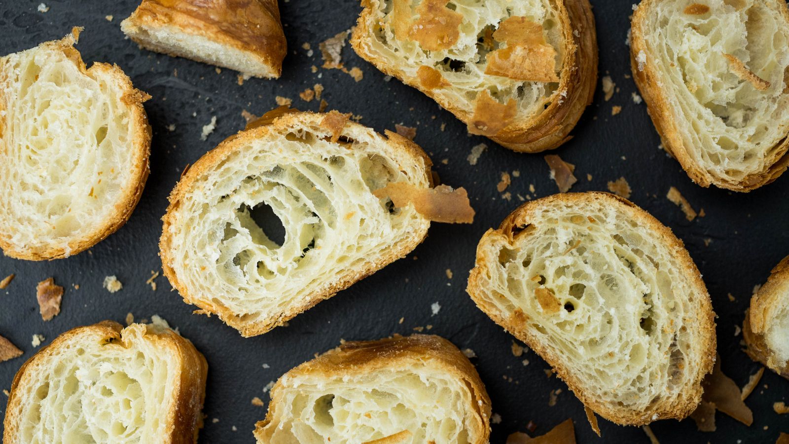 Sliced pastries showing airy honeycomb layers