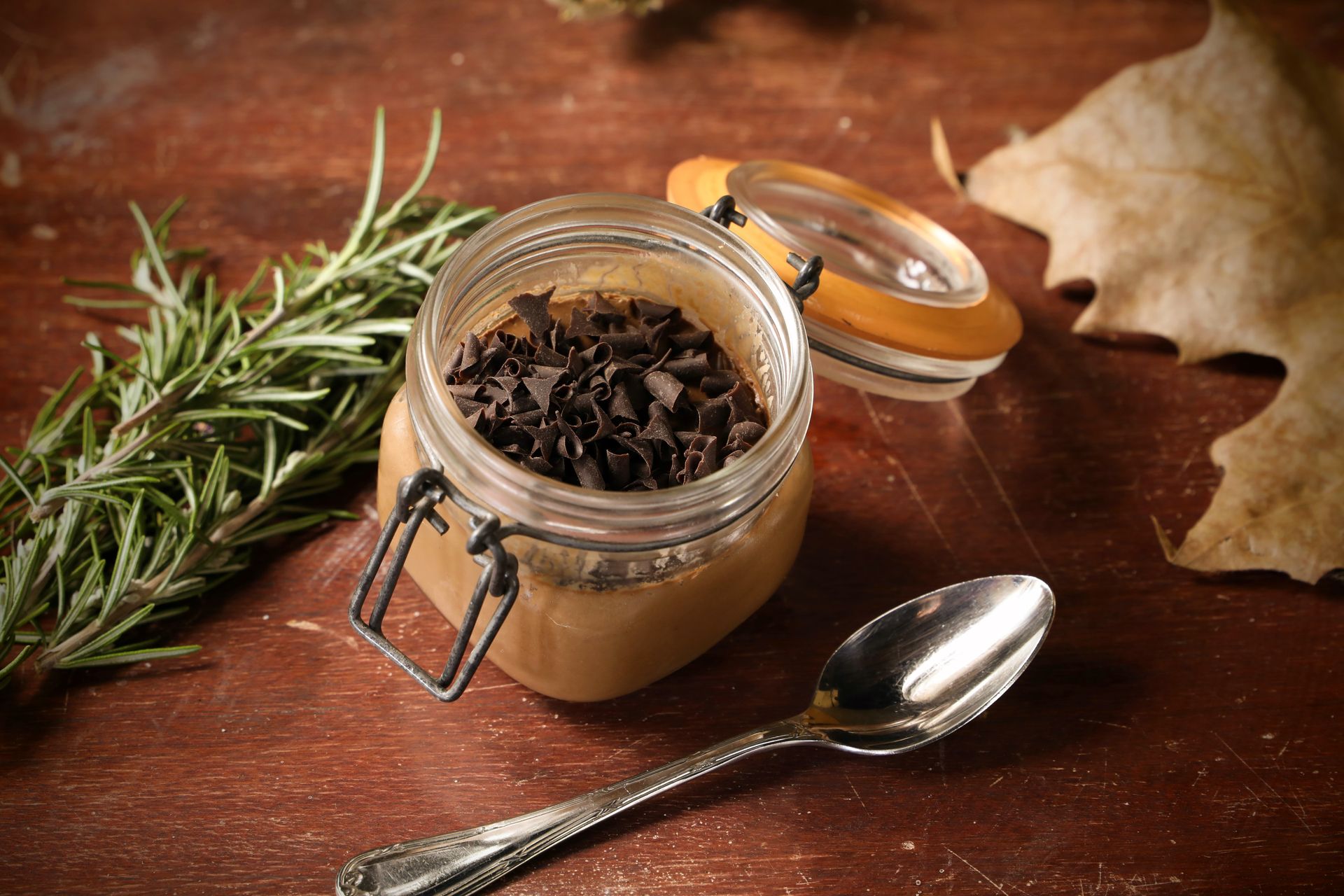 Chocolate mousse in a jar with chopped chocolate on top