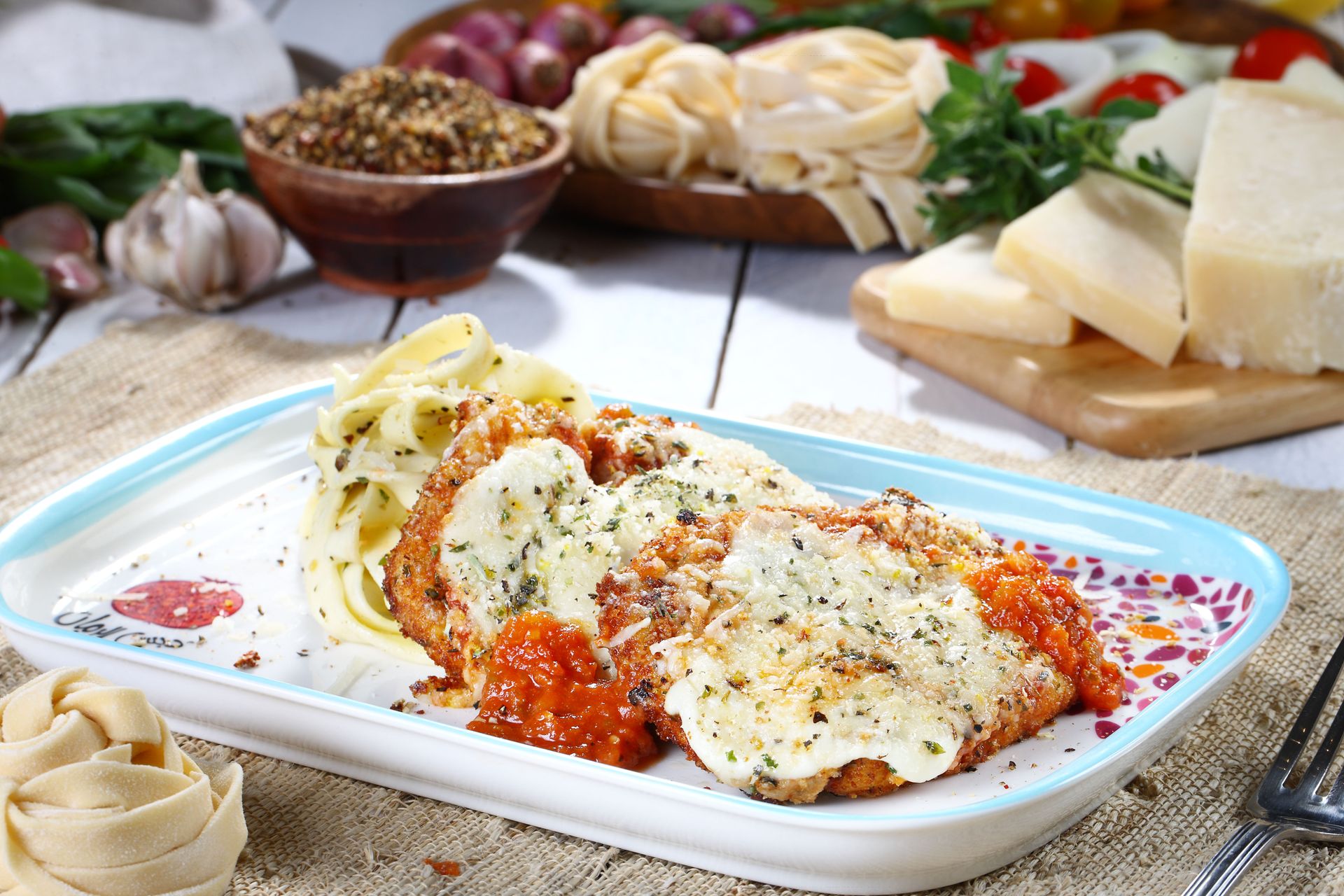 Chicken parmesan with melted mozzarella in a baking dish
