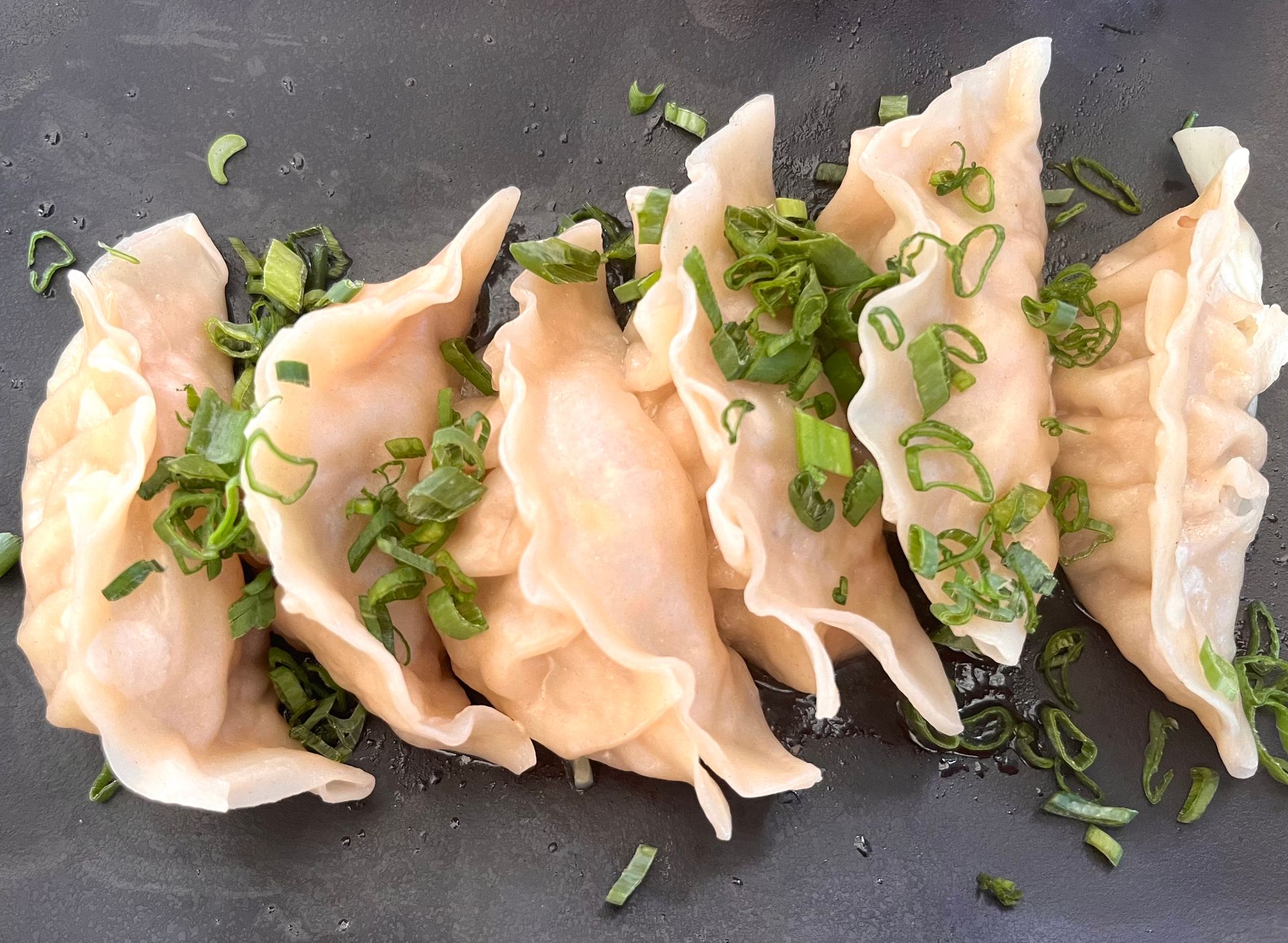 Ming-Na Wen recipes: pan fried pork potstickers with green onions