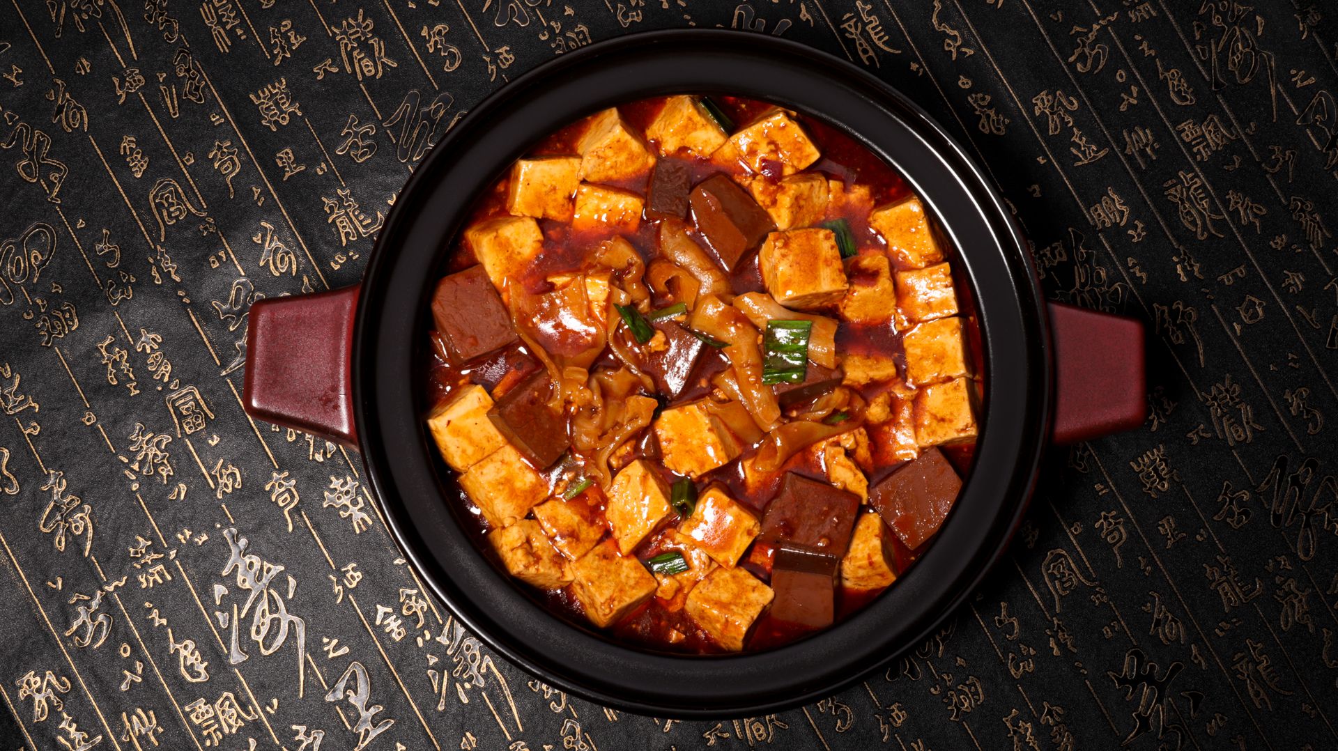 Mapo tofu with ground pork in a clay pot
