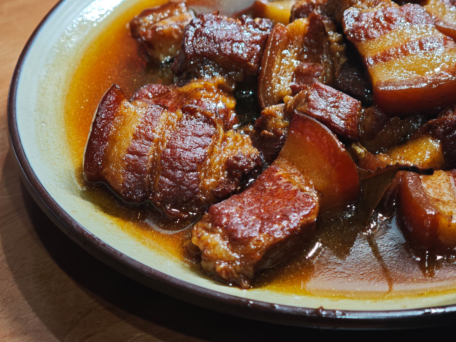 Braised pork belly in a rich glossy sauce