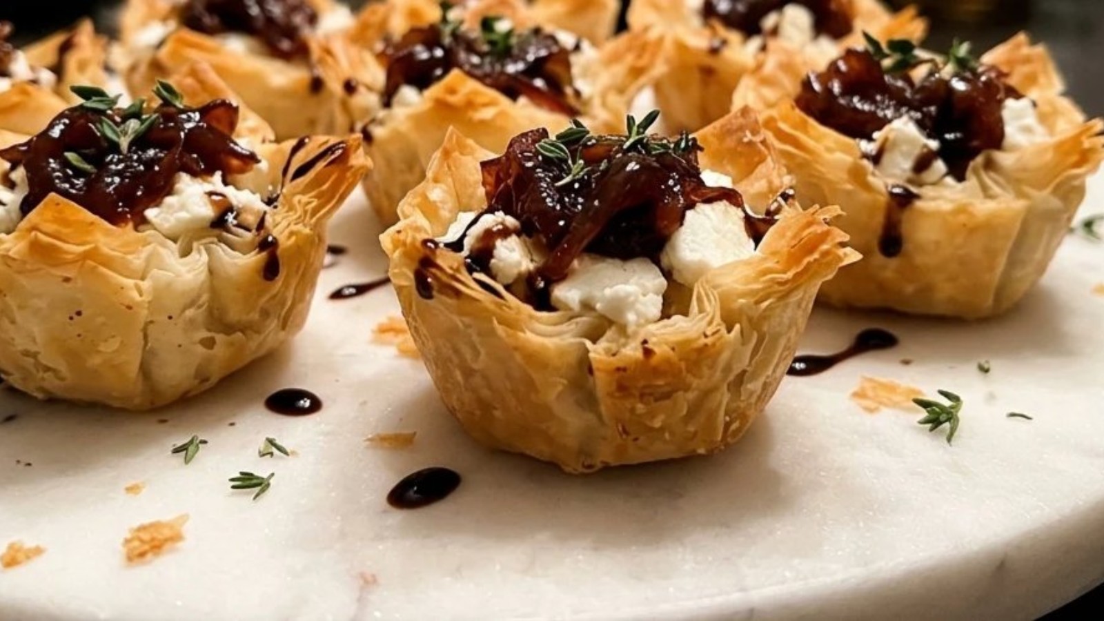 Phyllo cup appetizers with goat cheese, caramelized onion and balsamic