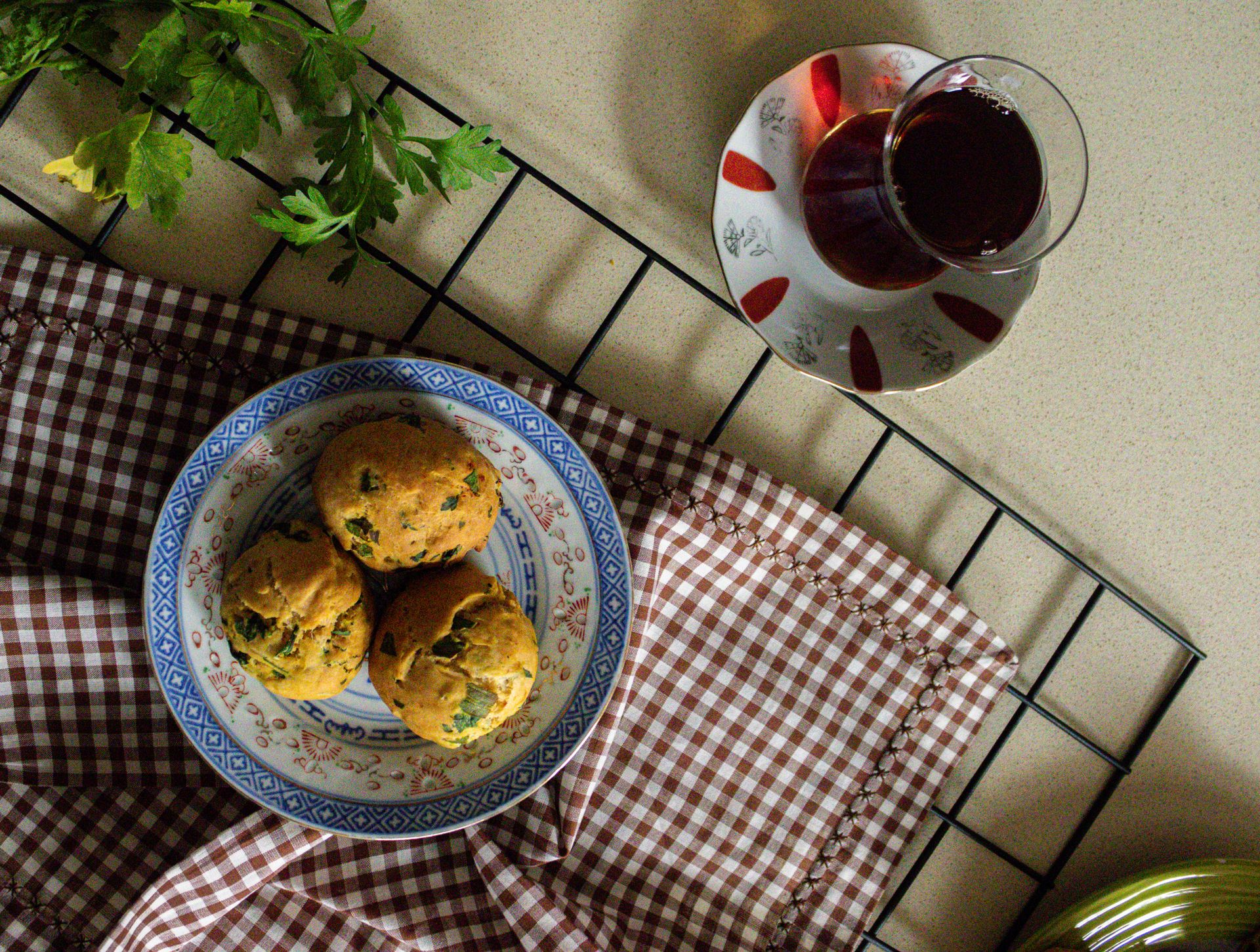 Herb muffins in a bowl on a table