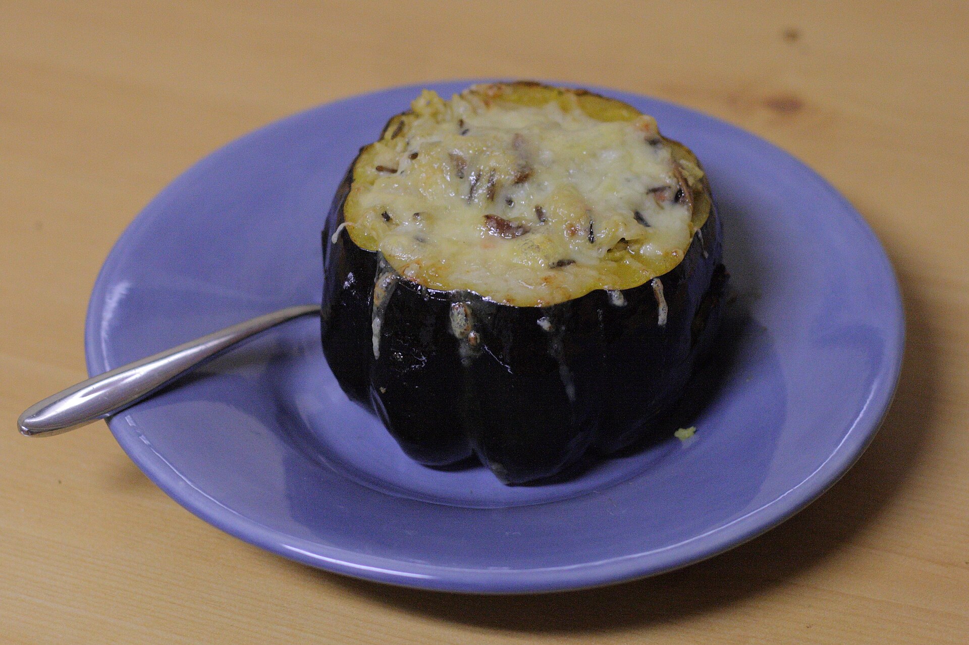 Stuffing mix recipes: stuffed acorn squash on a purple plate
