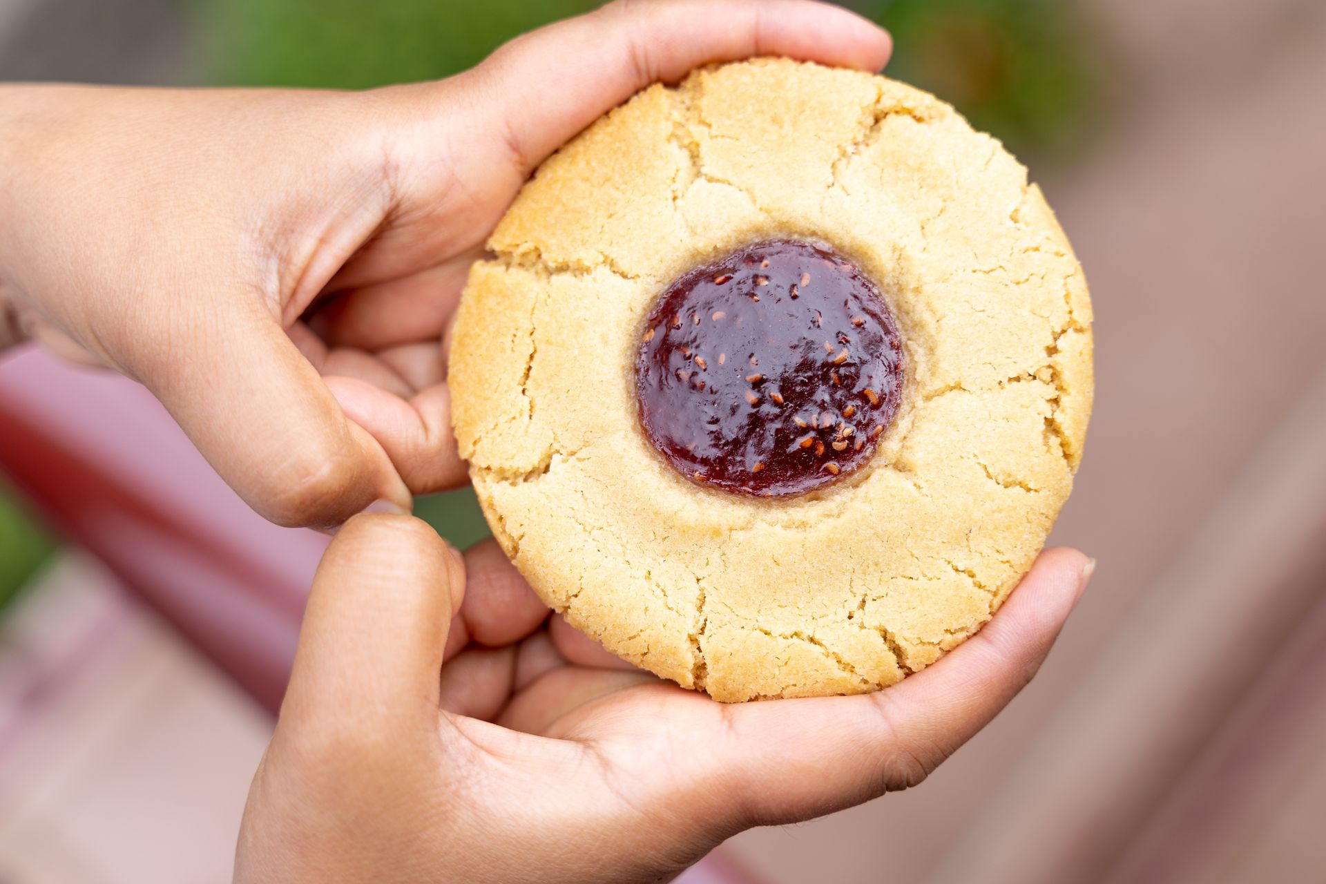 Thumbprint cookies: a big cookie with a ruby cranberry jam center