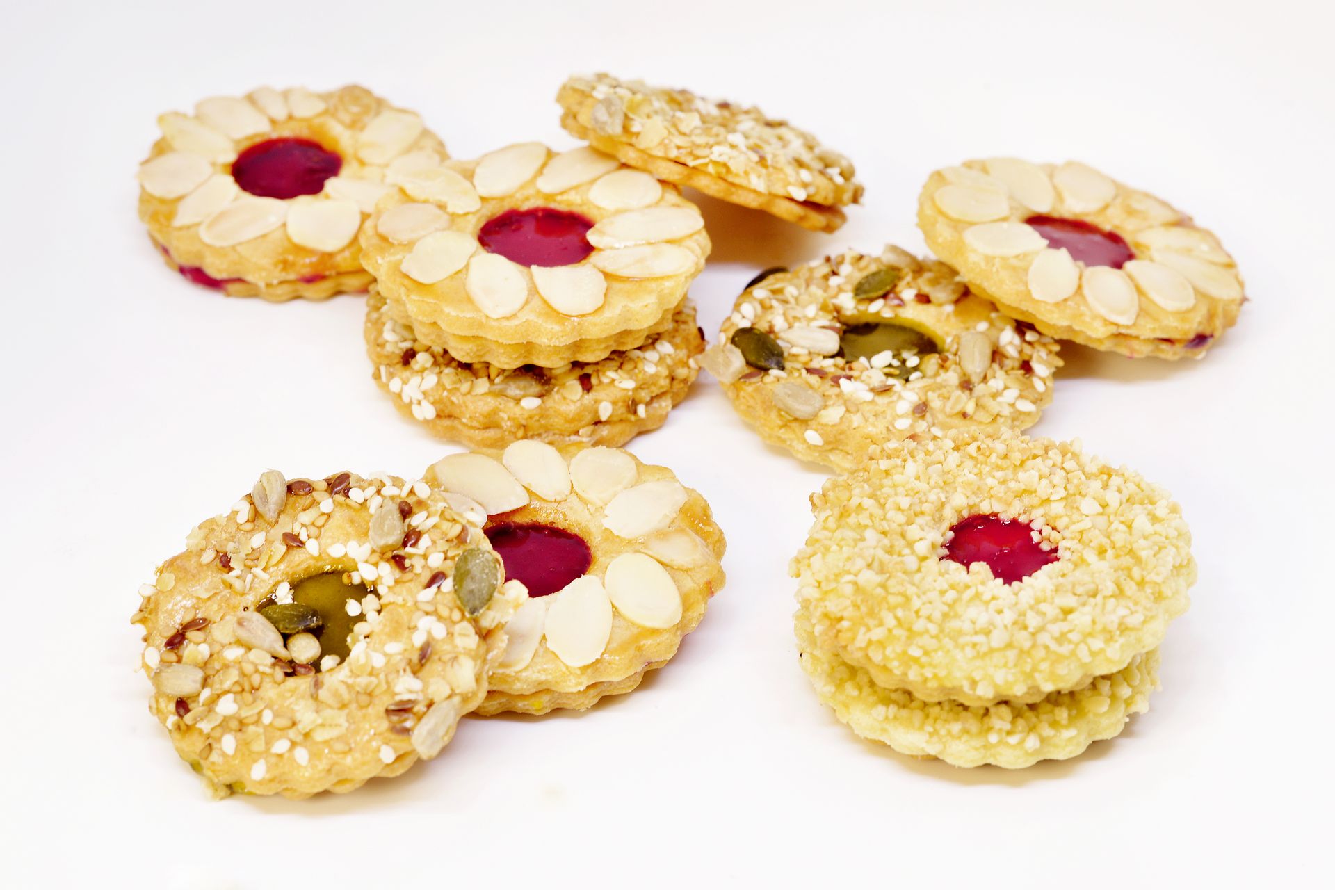 Nut-coated jam treats with red centers