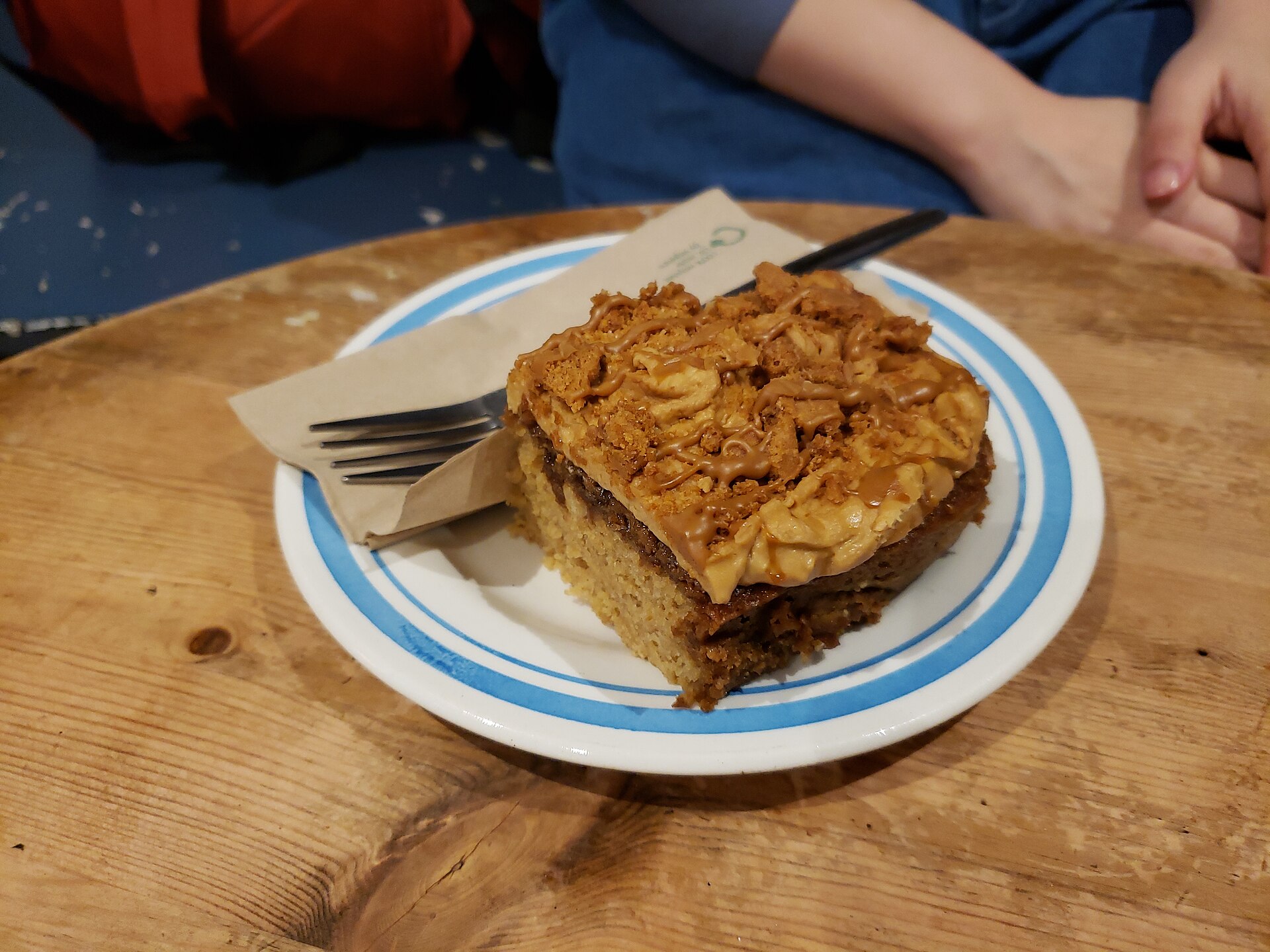 Snickerdoodle coffee cake slice with a cinnamon crumb top