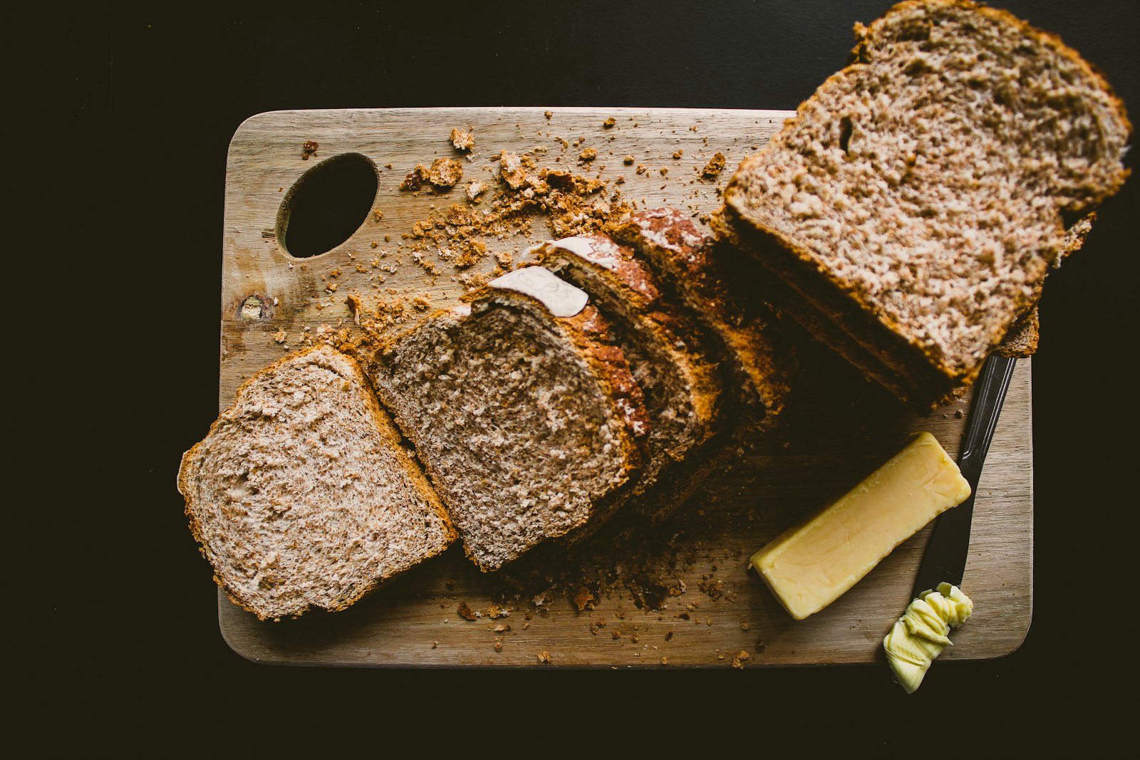 Old fashioned meatloaf recipes: a sliced loaf on a wooden board