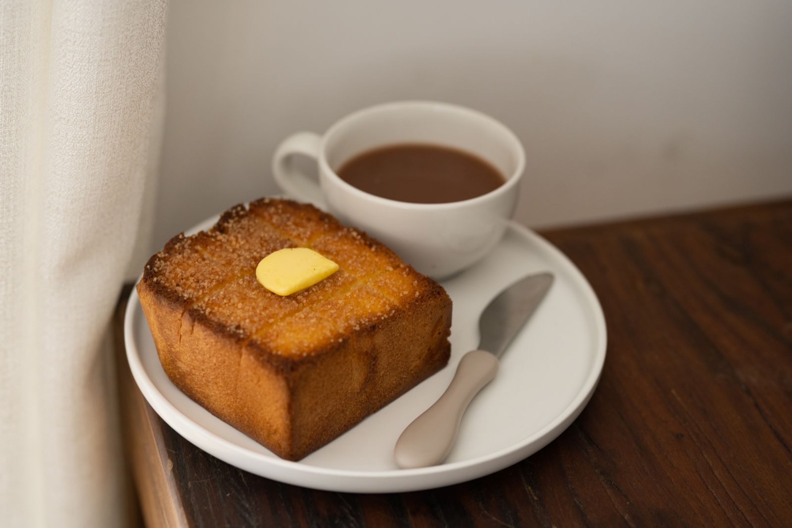 Buttered toast and a cup of coffee, simple celebrity breakfasts