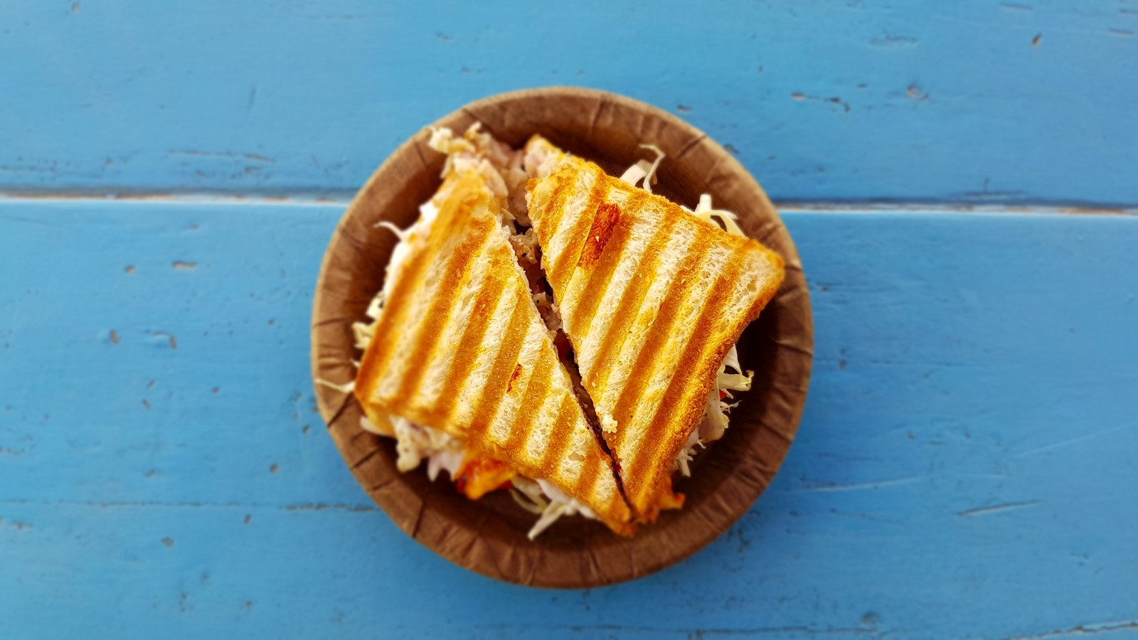 Two golden grilled cheese halves