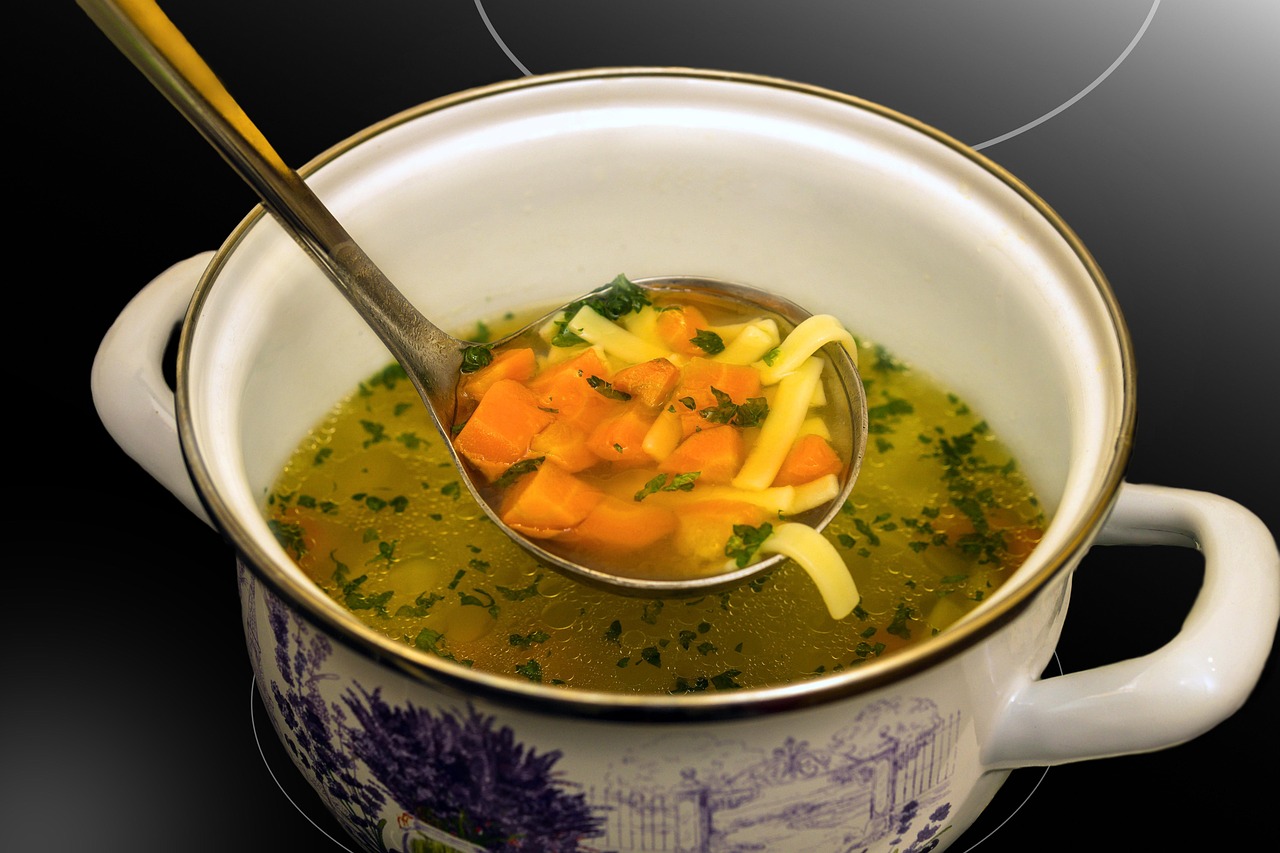 Pot of homemade broth made from saved food scraps