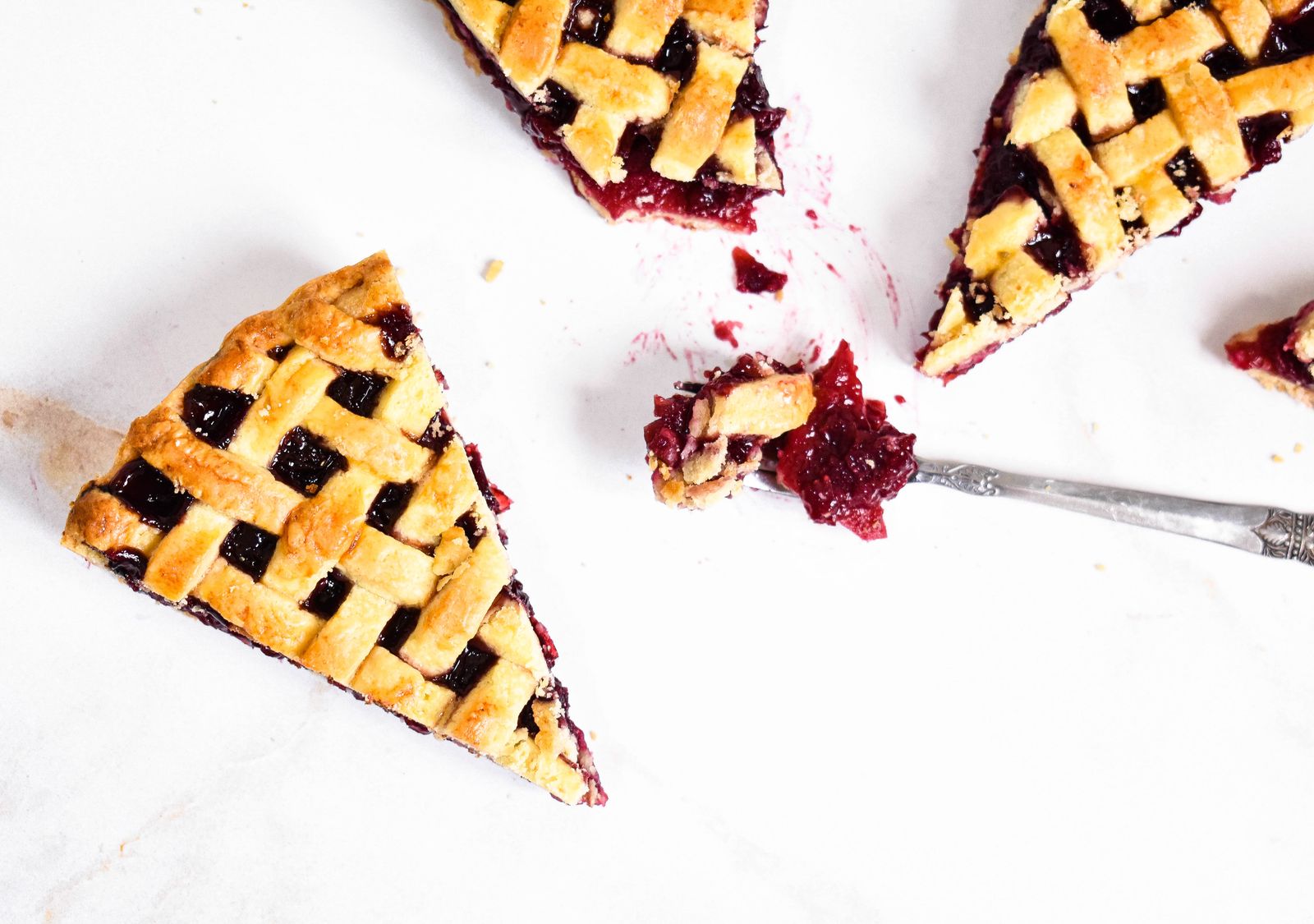 Clean slice of lattice berry pie