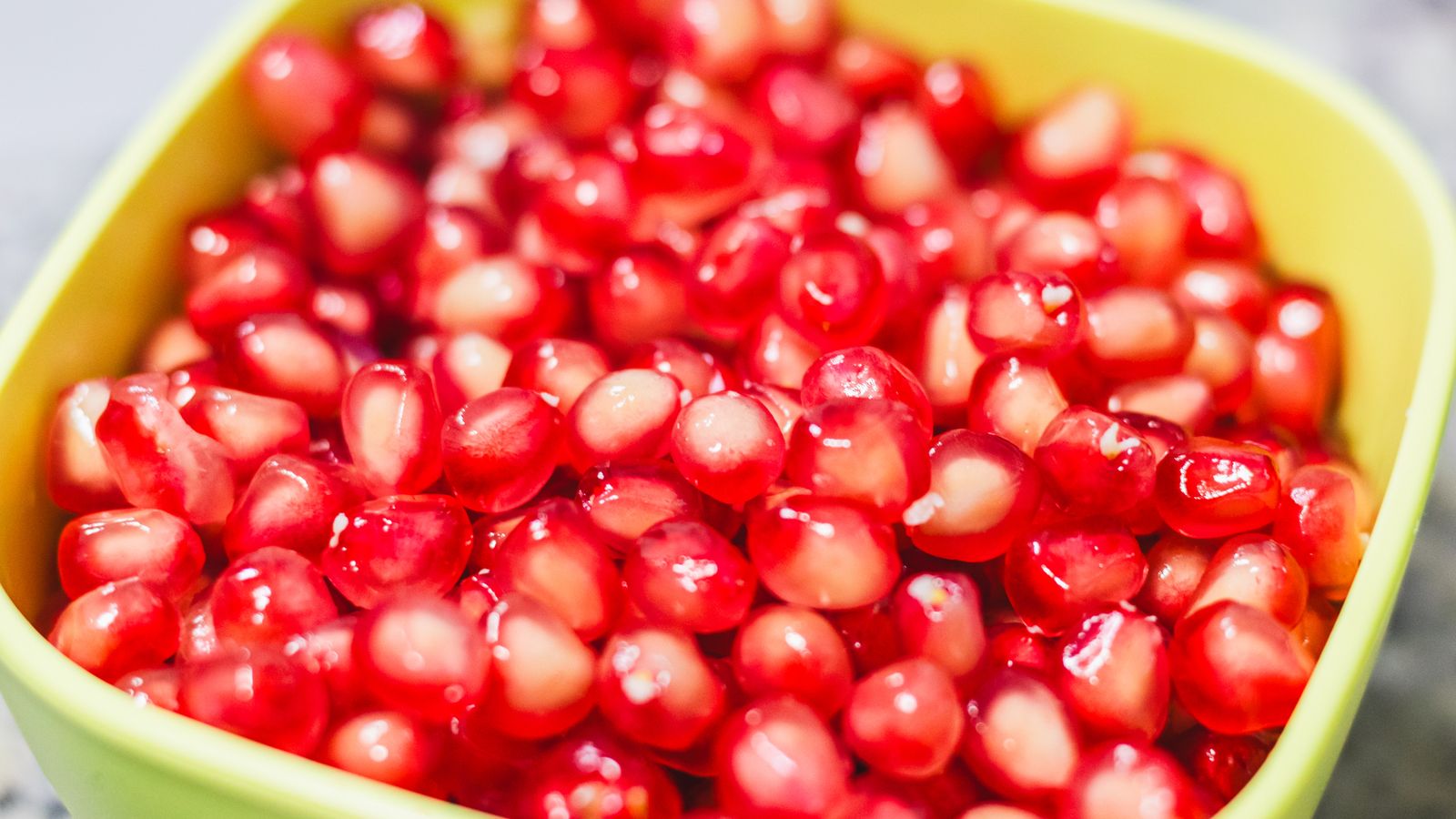 Bowl of ruby pomegranate seeds