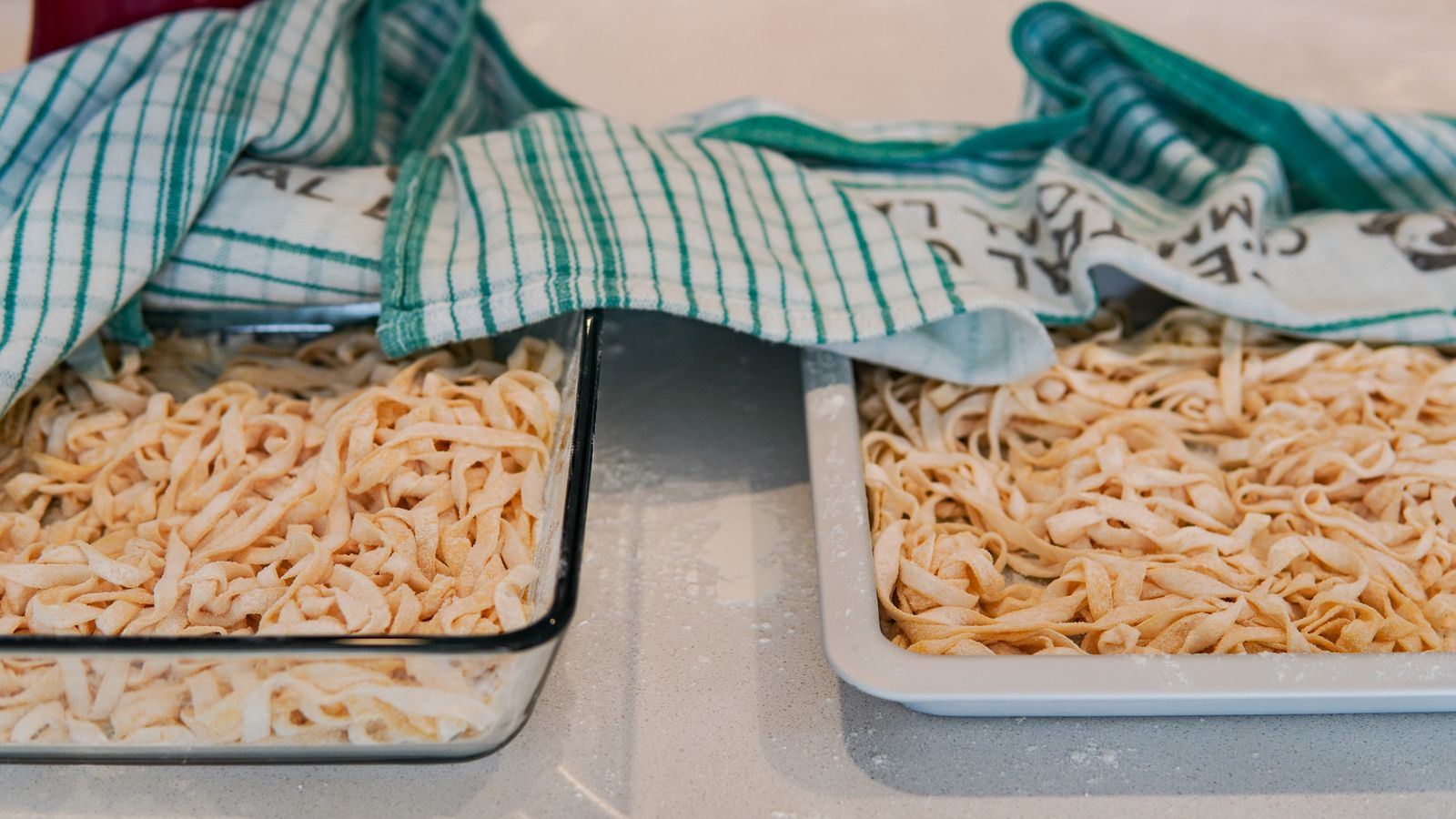 Fresh pasta drying on trays