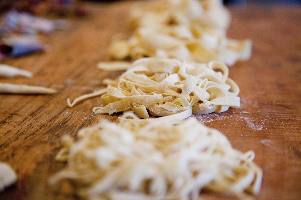 Hand-cut fresh fettuccine dusted with flour