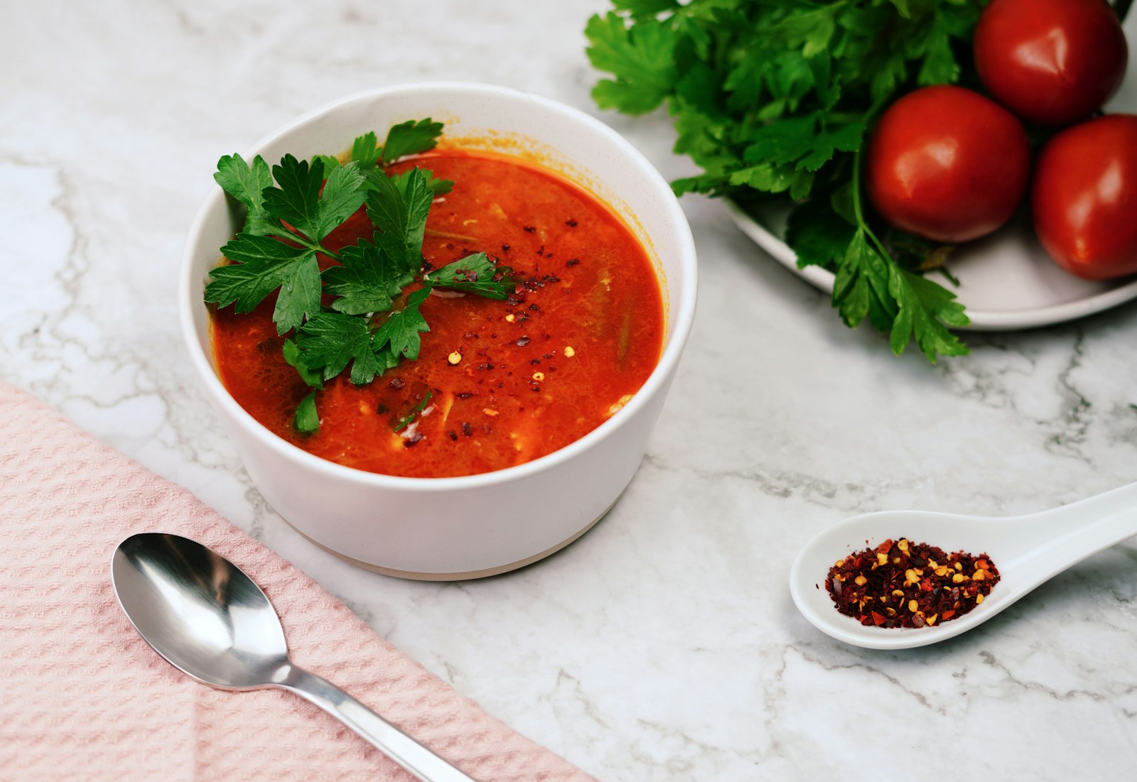 Dairy-free bowl with parsley and chili flakes
