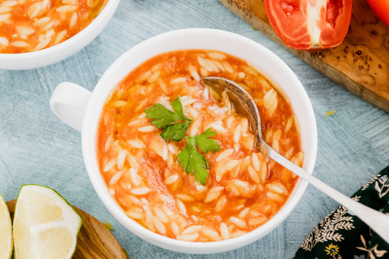 Creamy tomato soup with orzo and fresh herbs