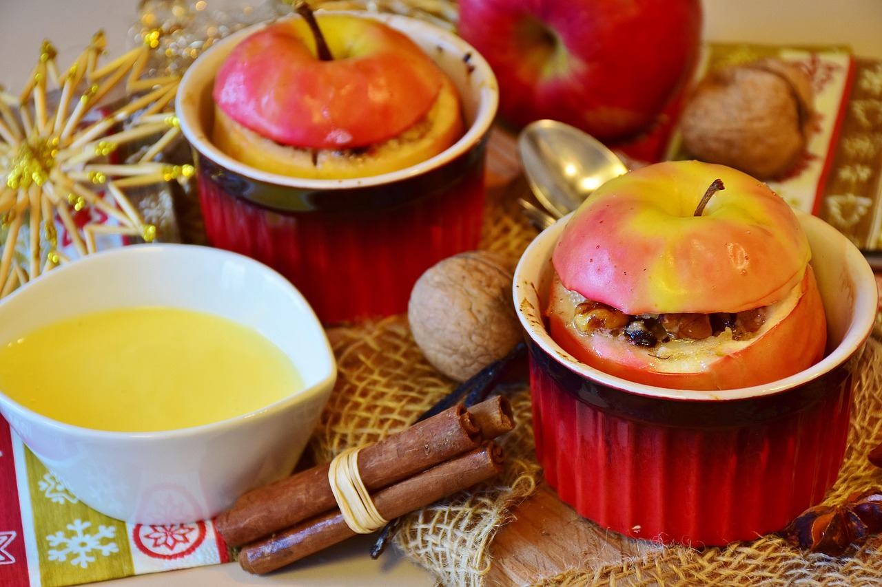 Warm baked apple in a red dish
