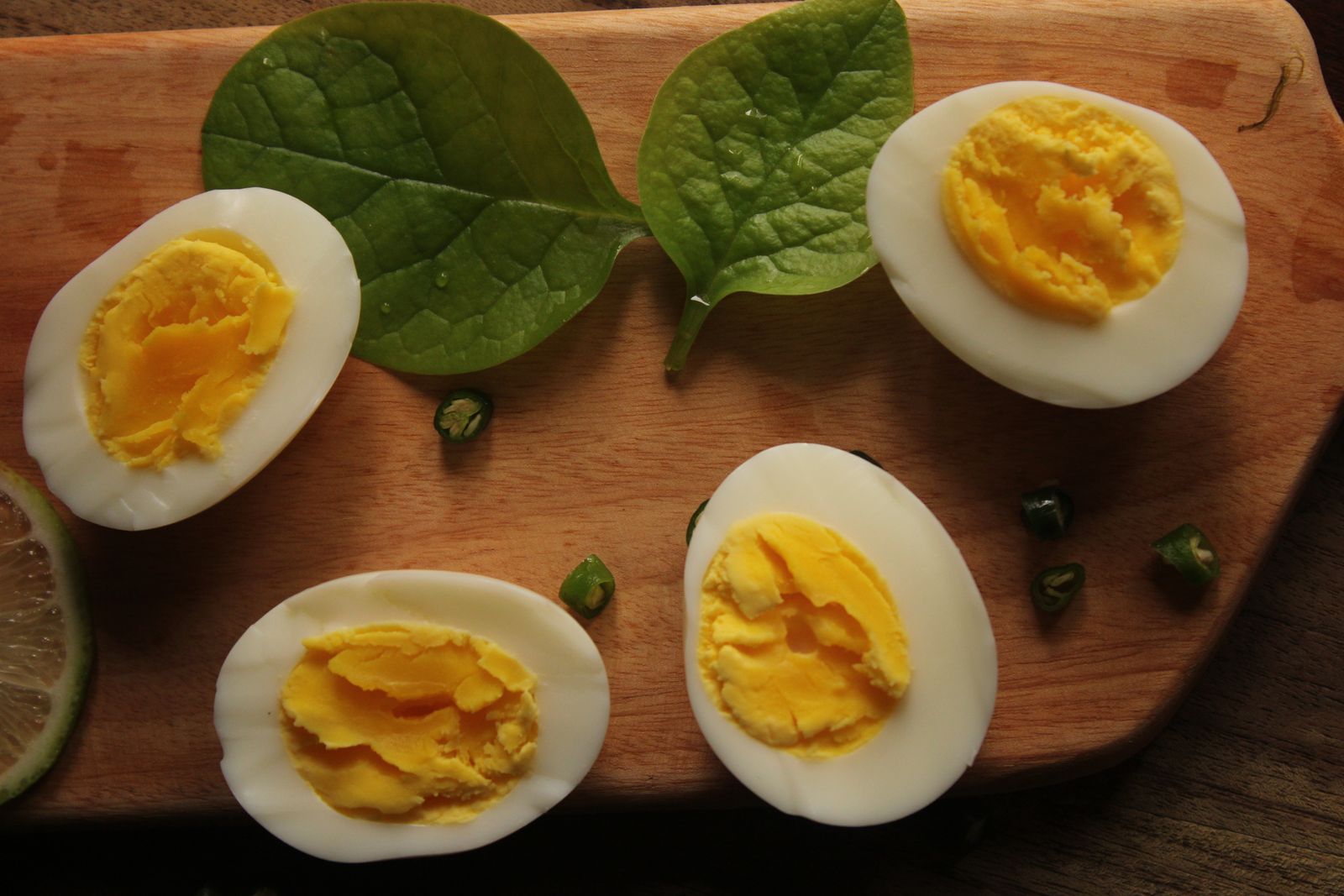 Halved boiled eggs ready for deviled eggs