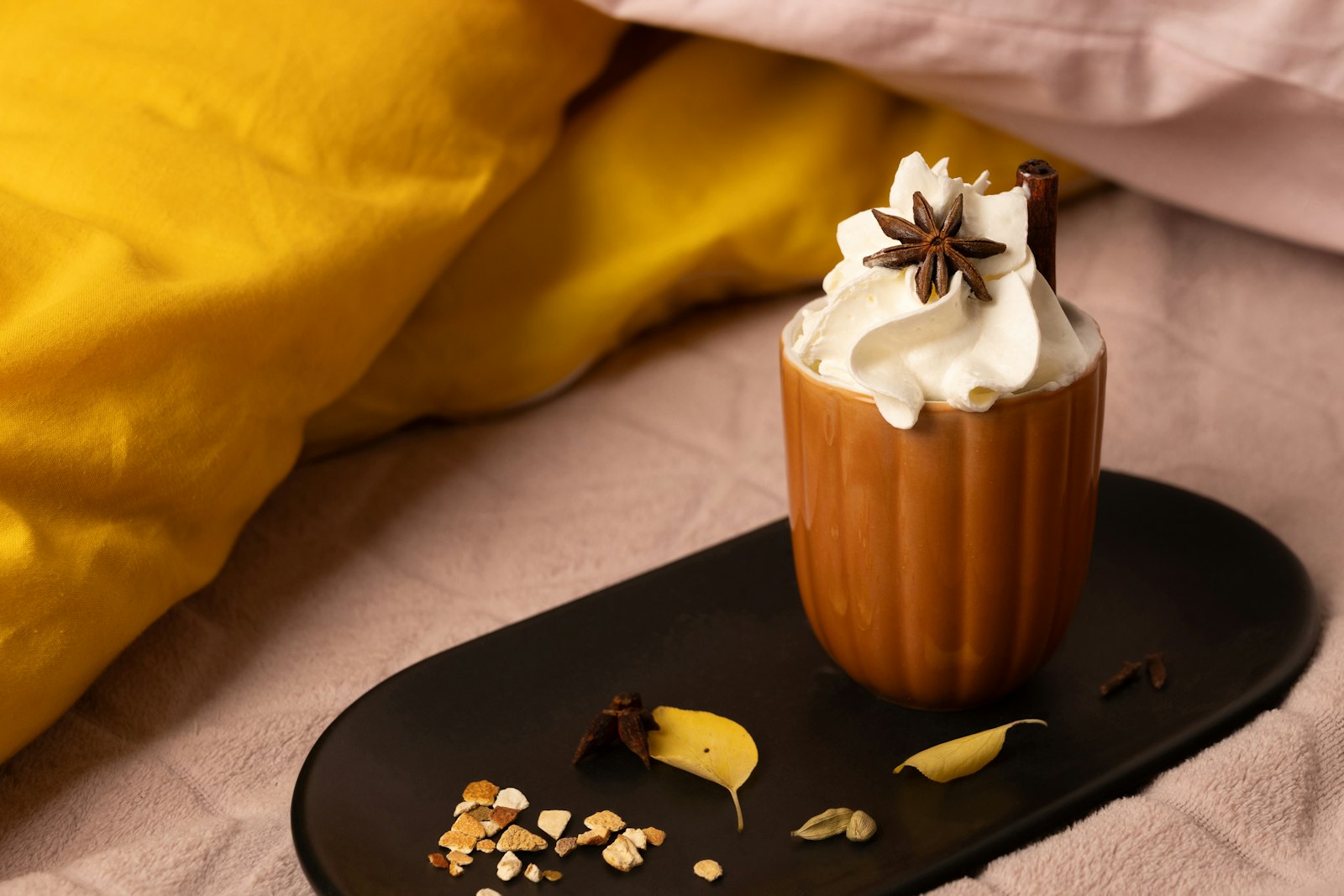Spiced pumpkin treat topped with whipped cream and cinnamon