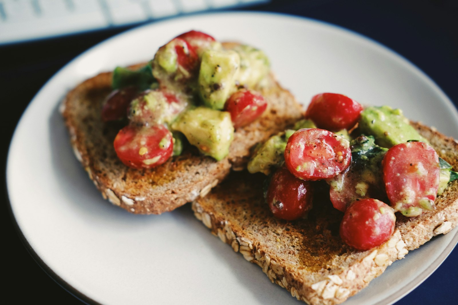Avocado toast with tomatoes, ready for chili crisp recipes