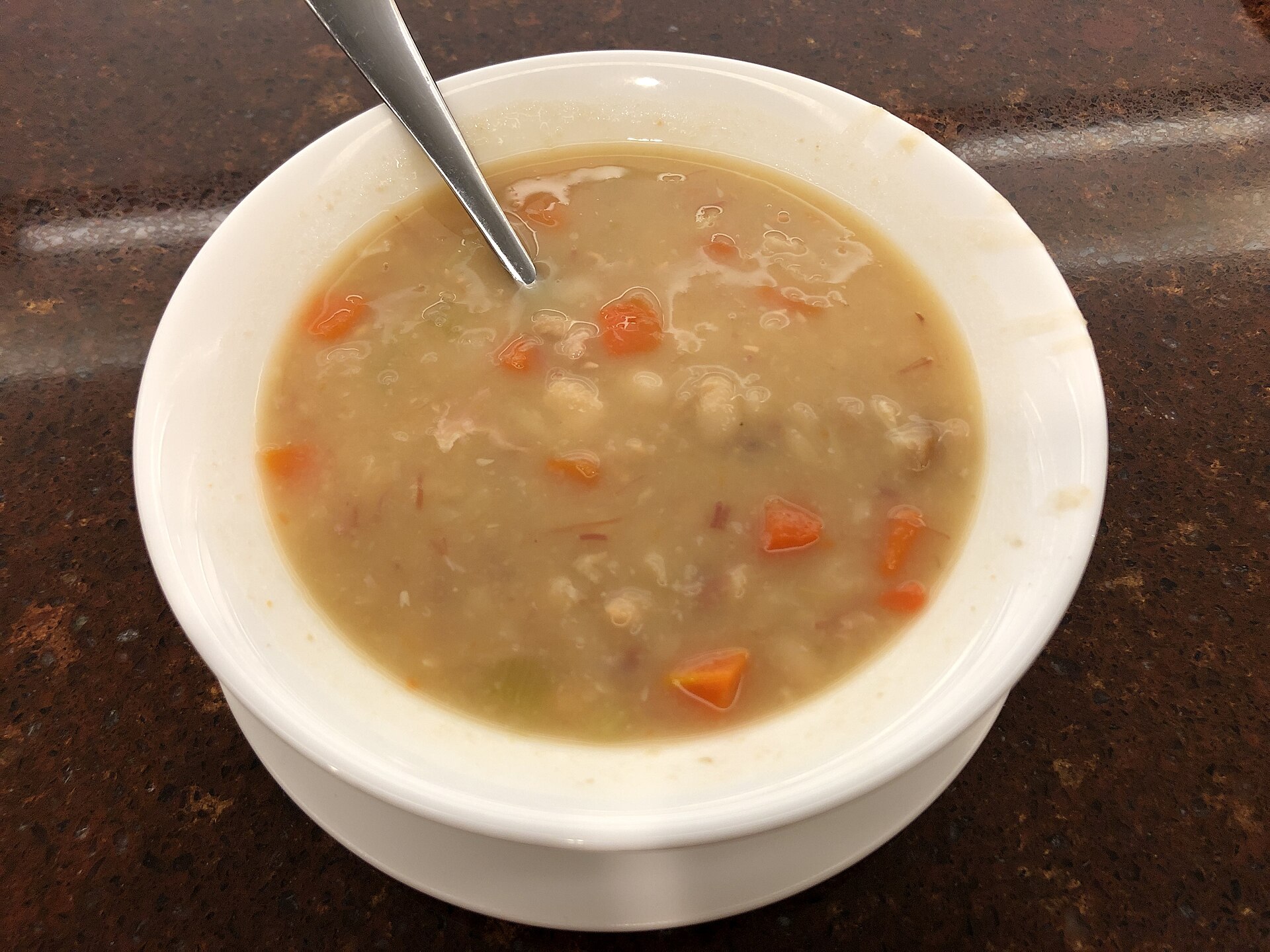 A bowl of navy bean soup with ham, one of the classic Depression era dinners