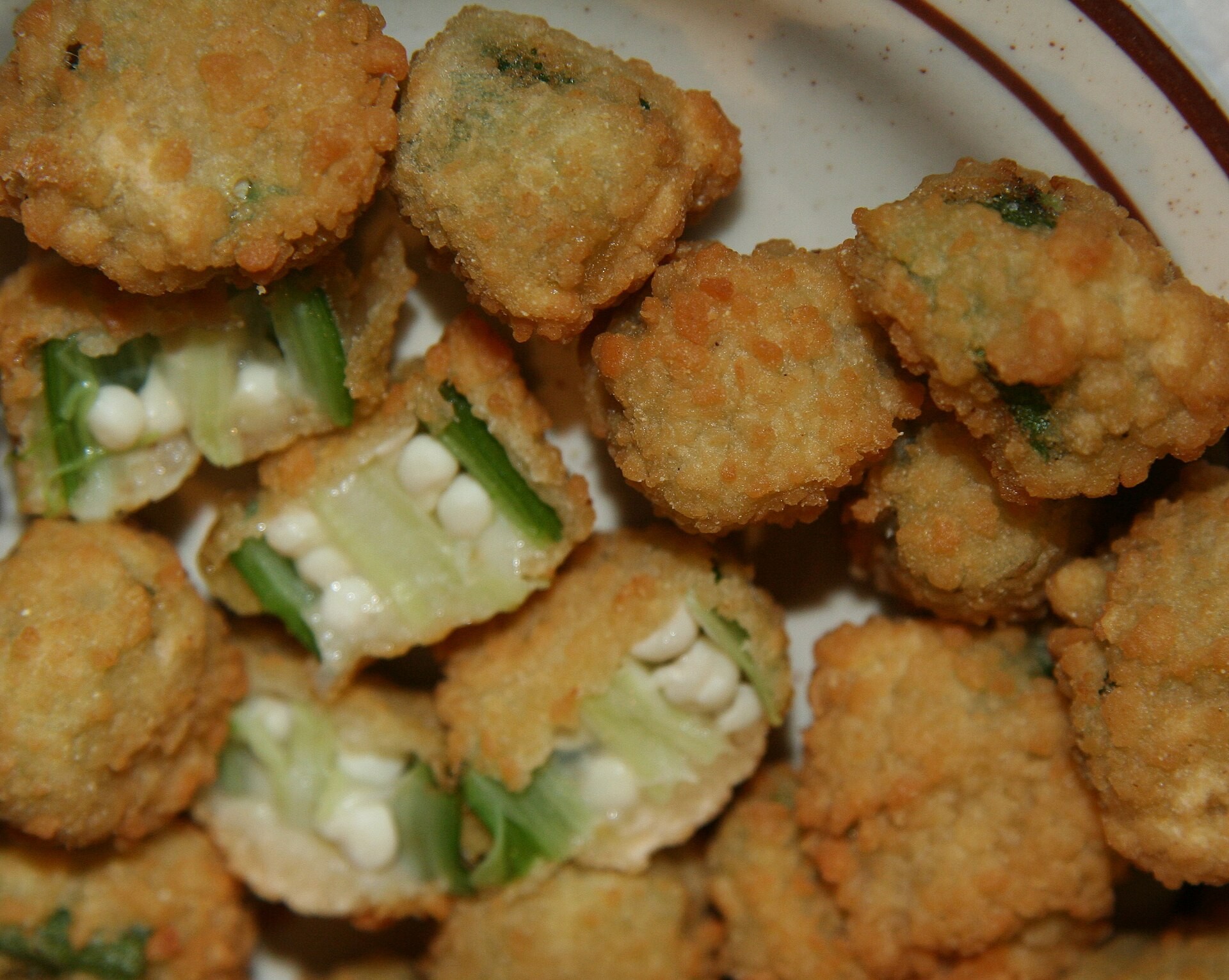 Plate of crispy cornmeal fried okra rounds