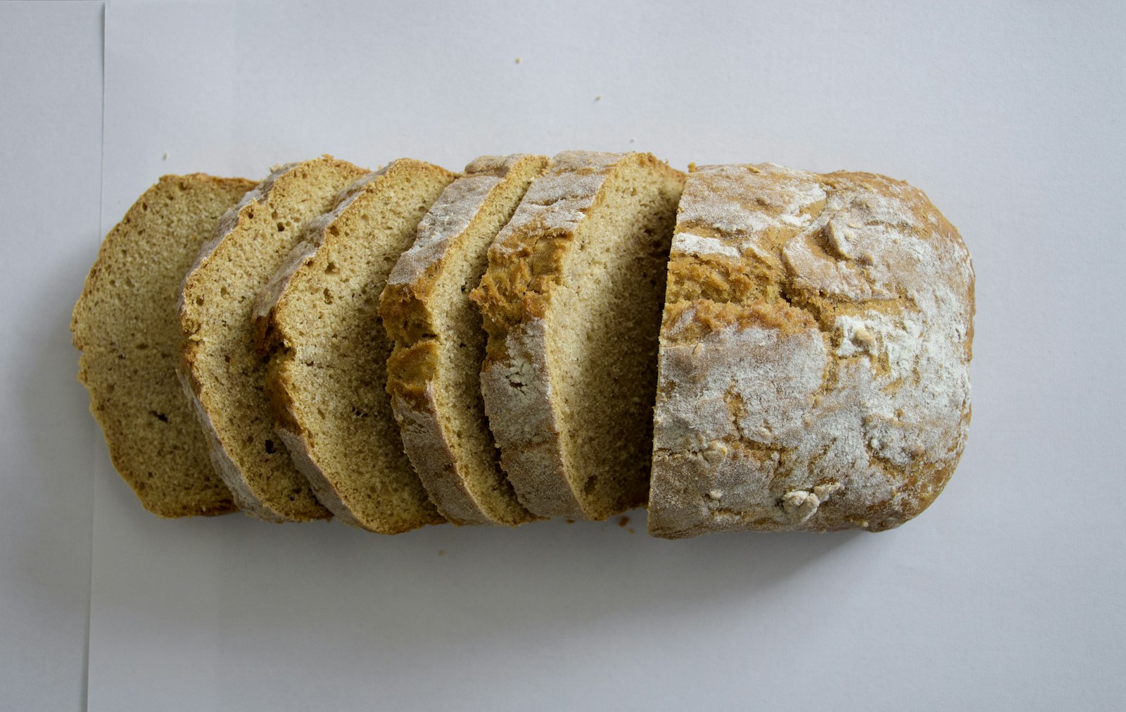 Sliced loaf of homemade quick bread