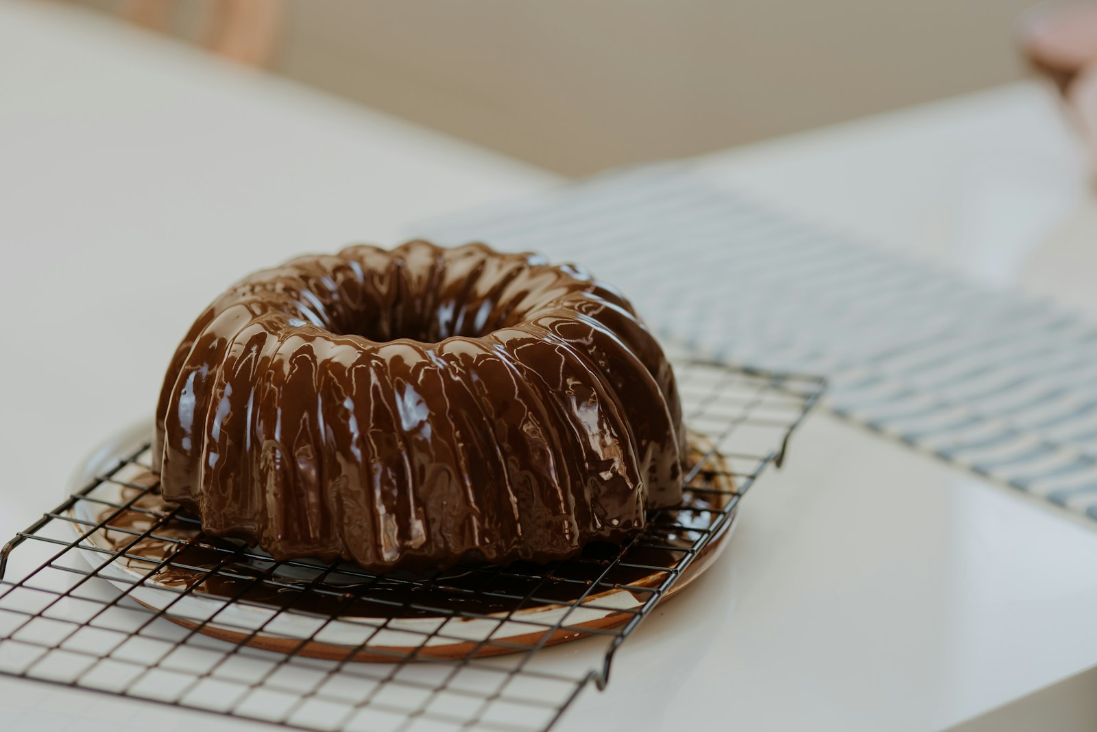 Glazed bundt cake on a cooling rack