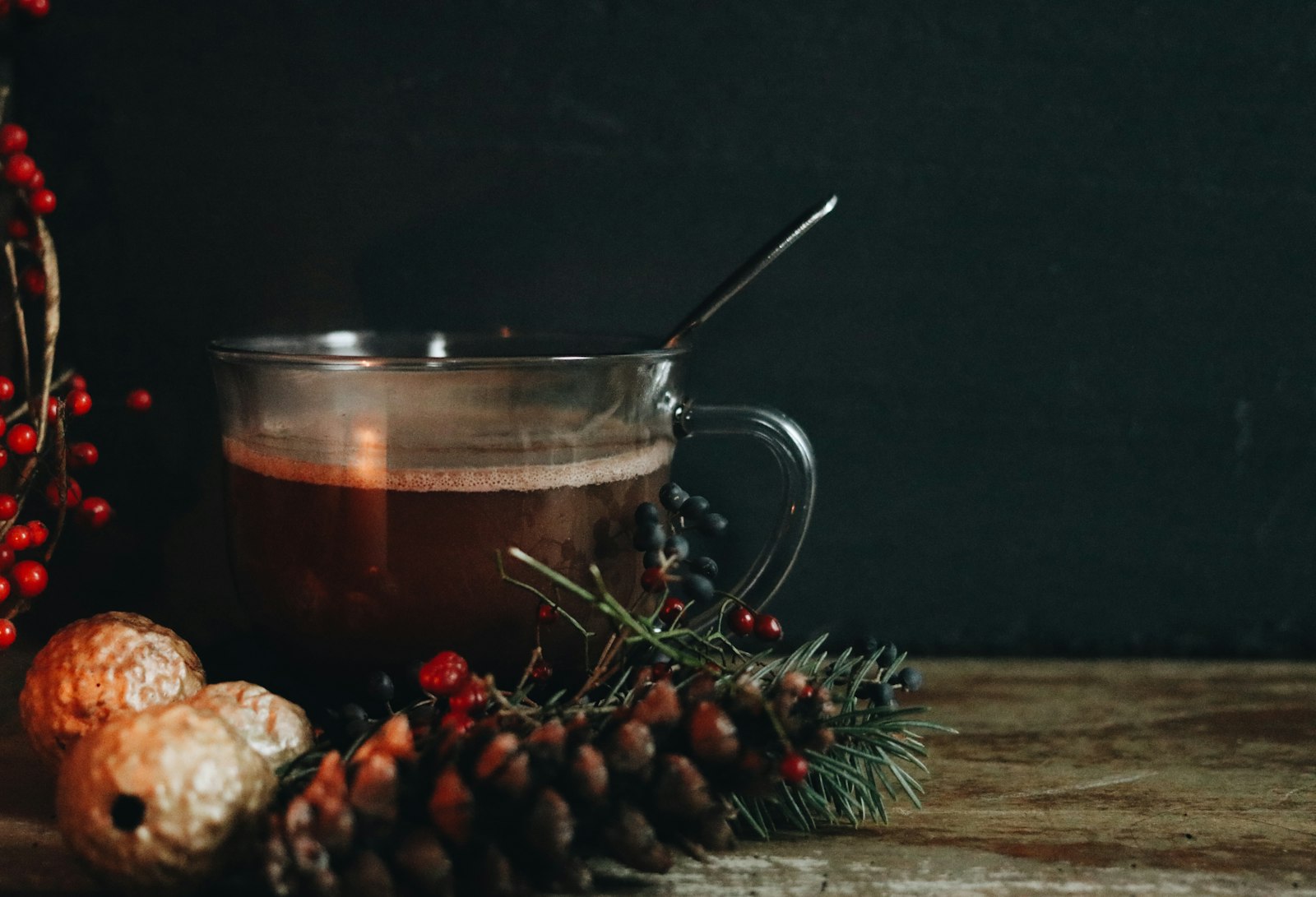 Hot mulled apple cider in a glass mug