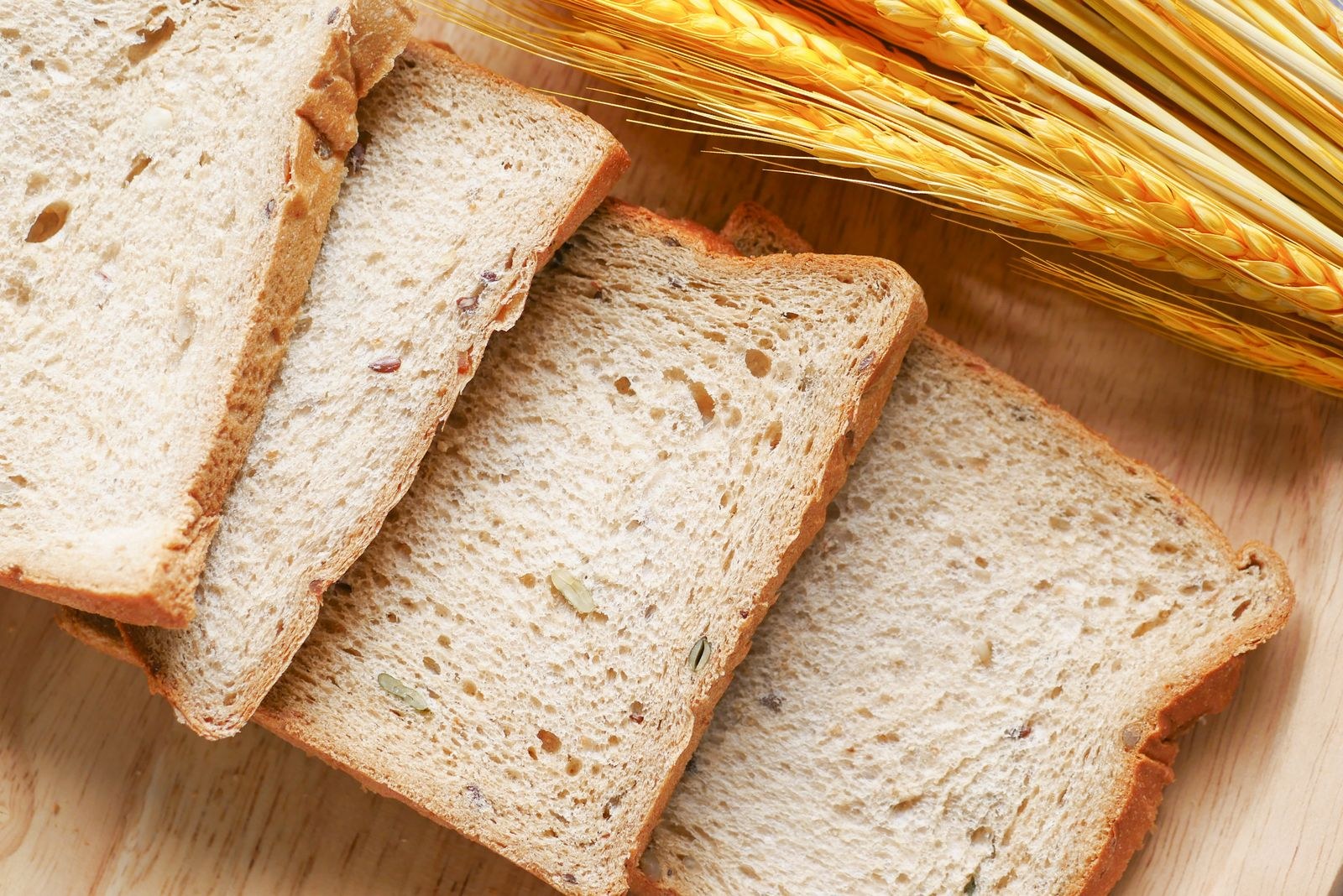 Slices of sandwich bread ready to freeze