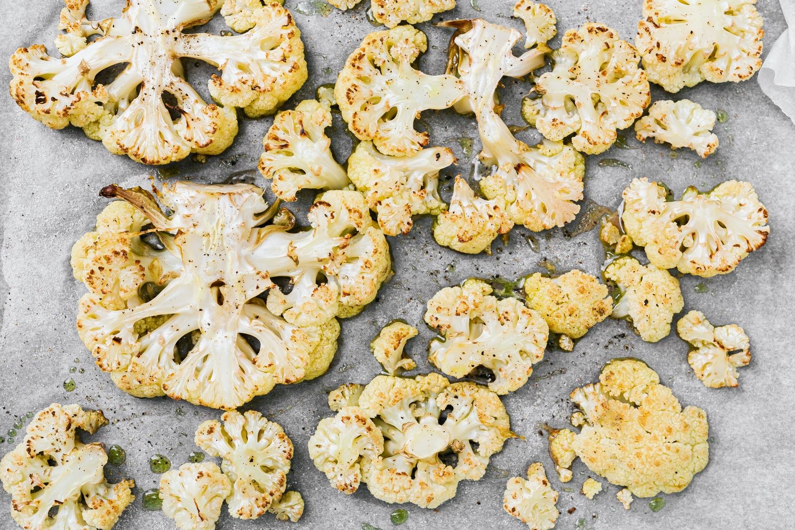 Roasted cauliflower on a lined sheet pan