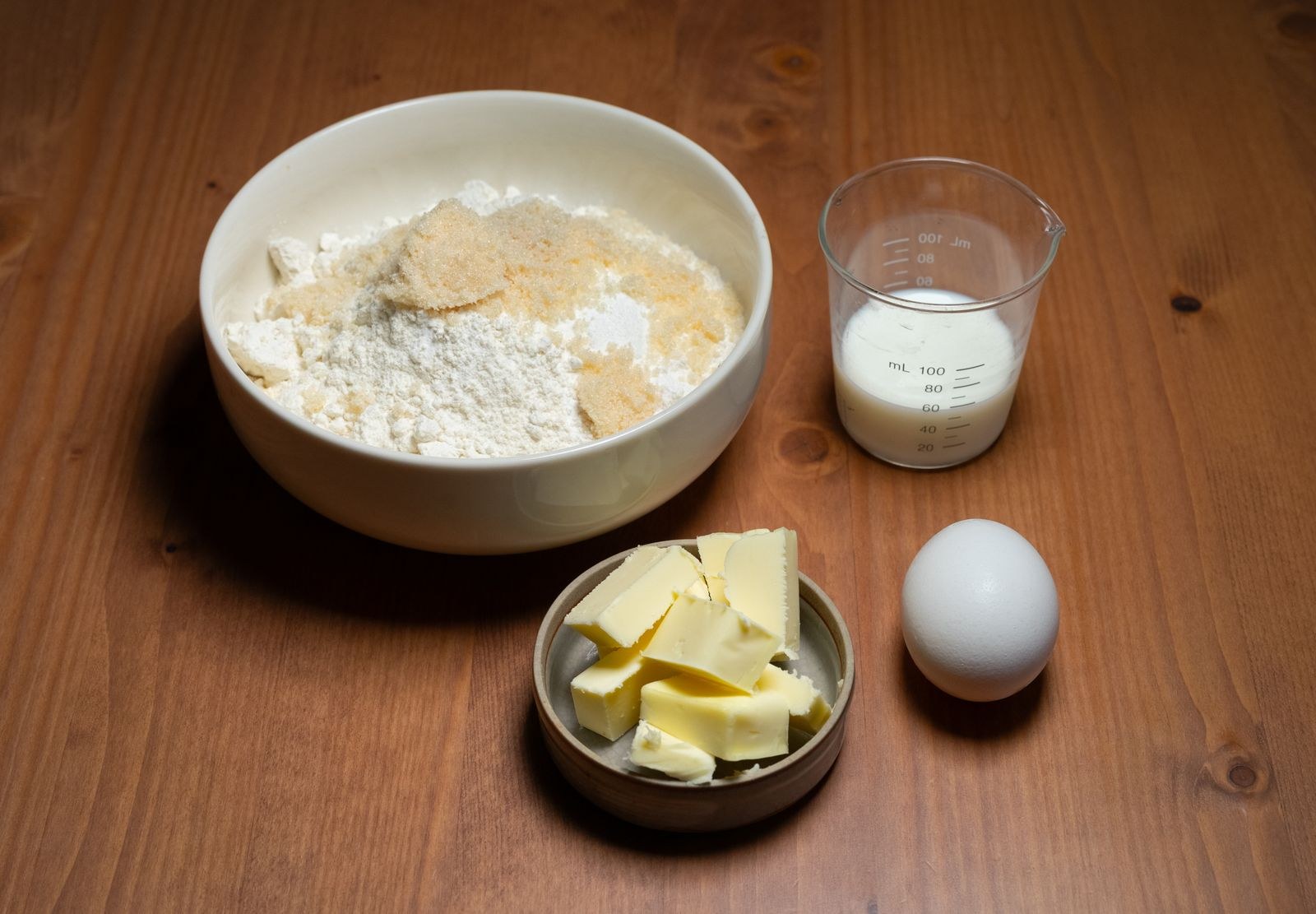 Kitchen prep hacks: butter, flour, milk and an egg set out for flaky biscuits