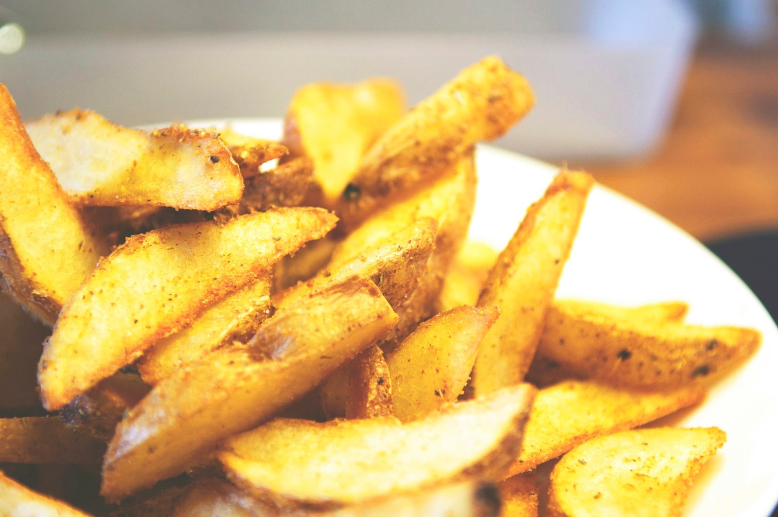 Crispy reheated potato wedges in a bowl