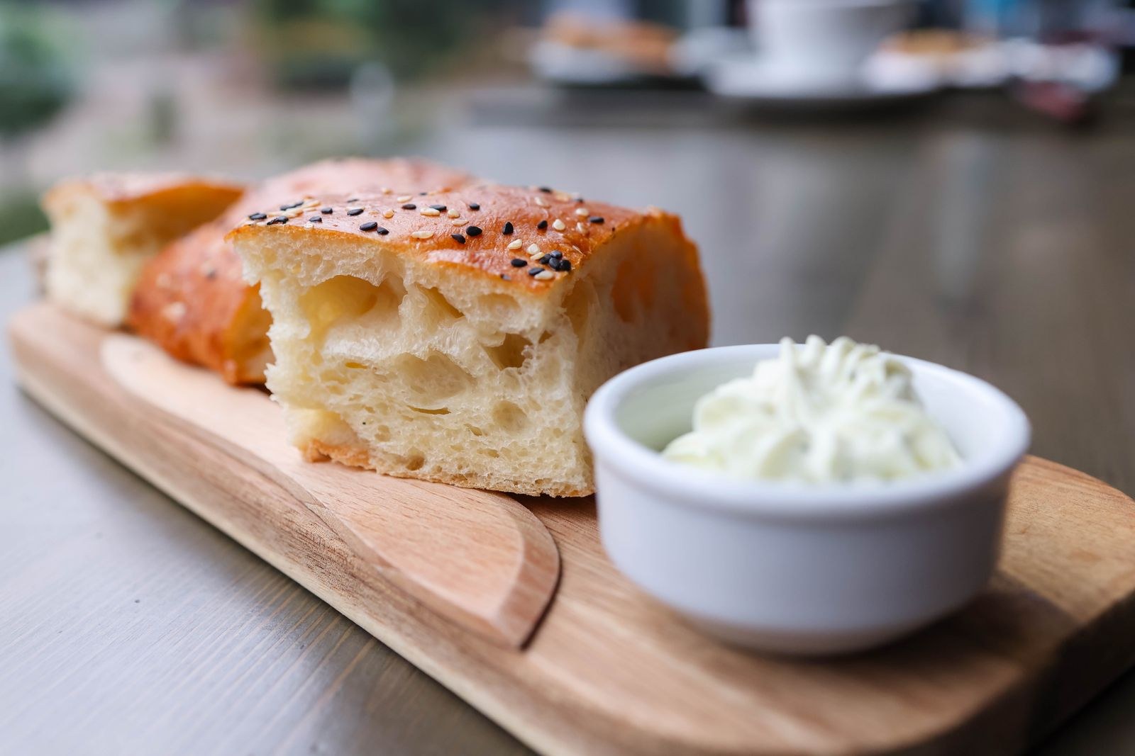 Golden cheesy bread with a creamy dip