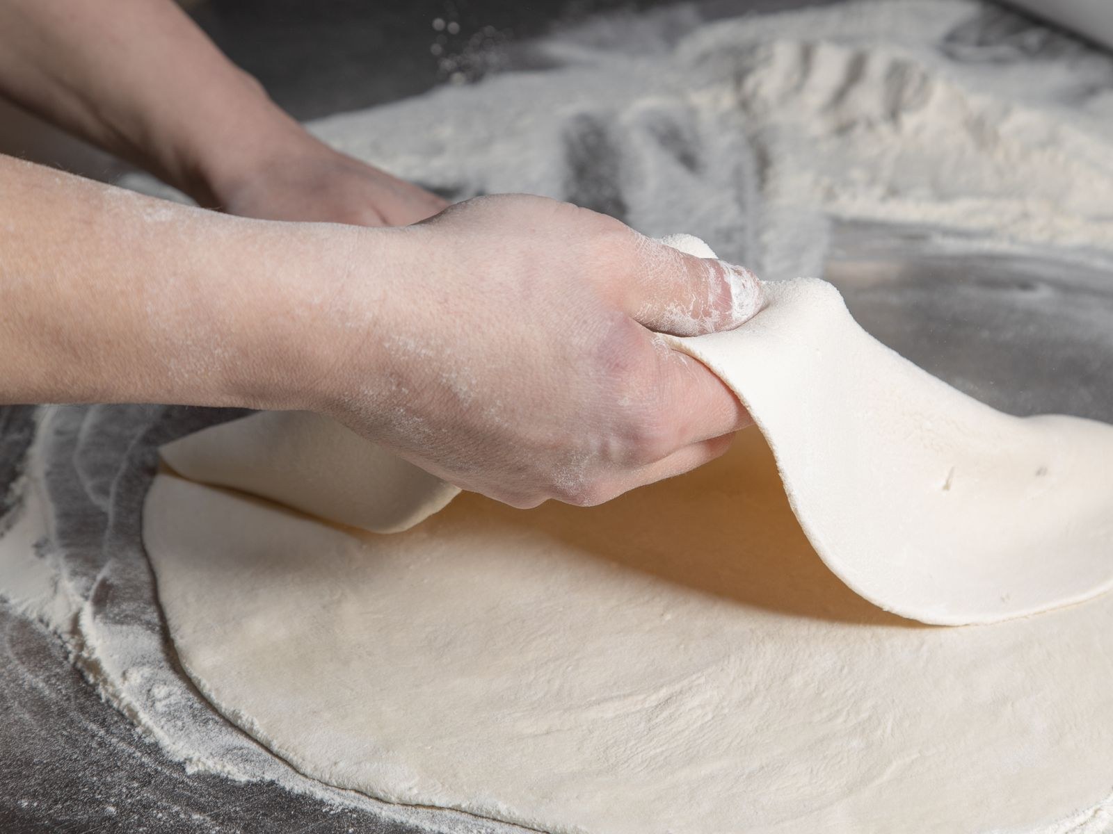 Bread machine recipes for the dough cycle: stretching pizza dough