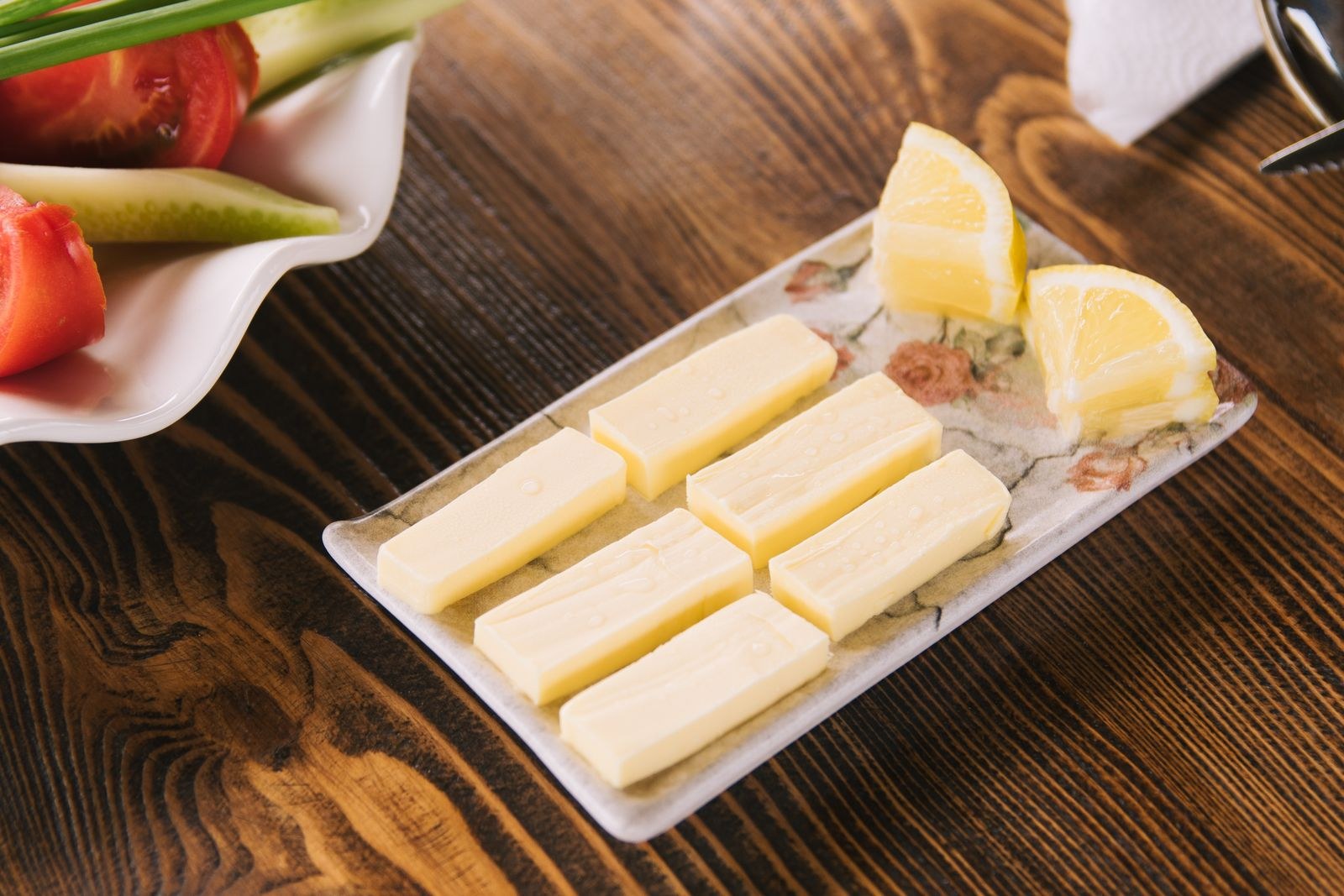 Butter pats on a plate