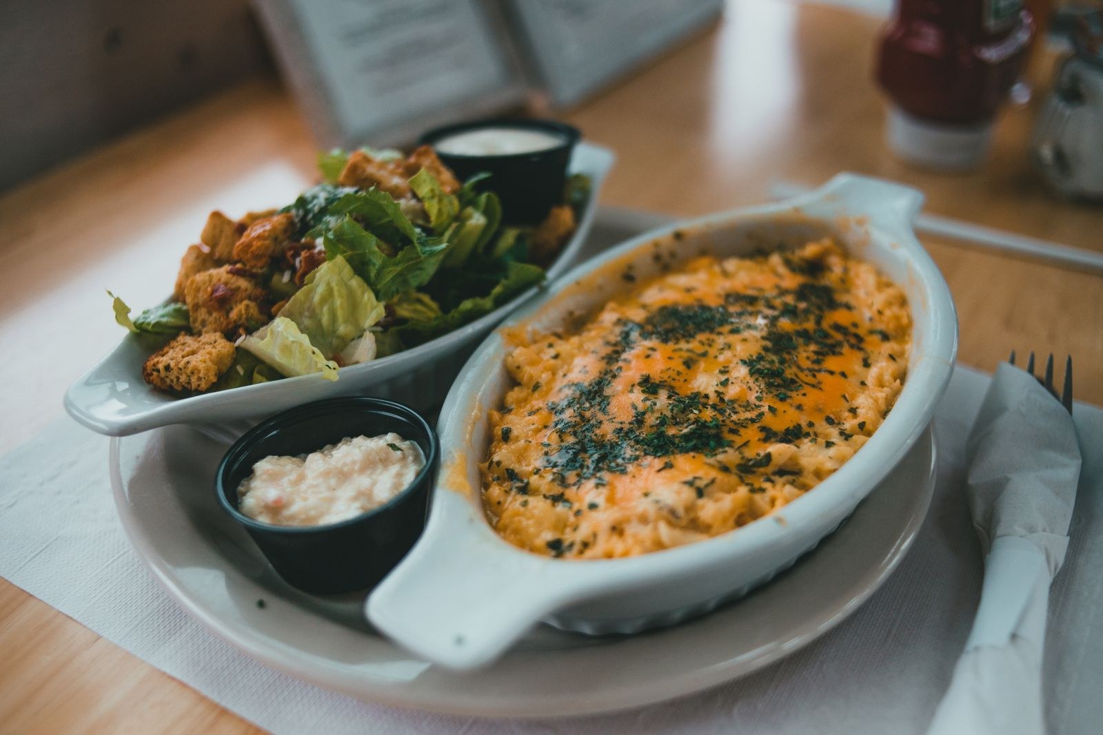 Pasta hacks for mac and cheese: a baked dish with salad on the side