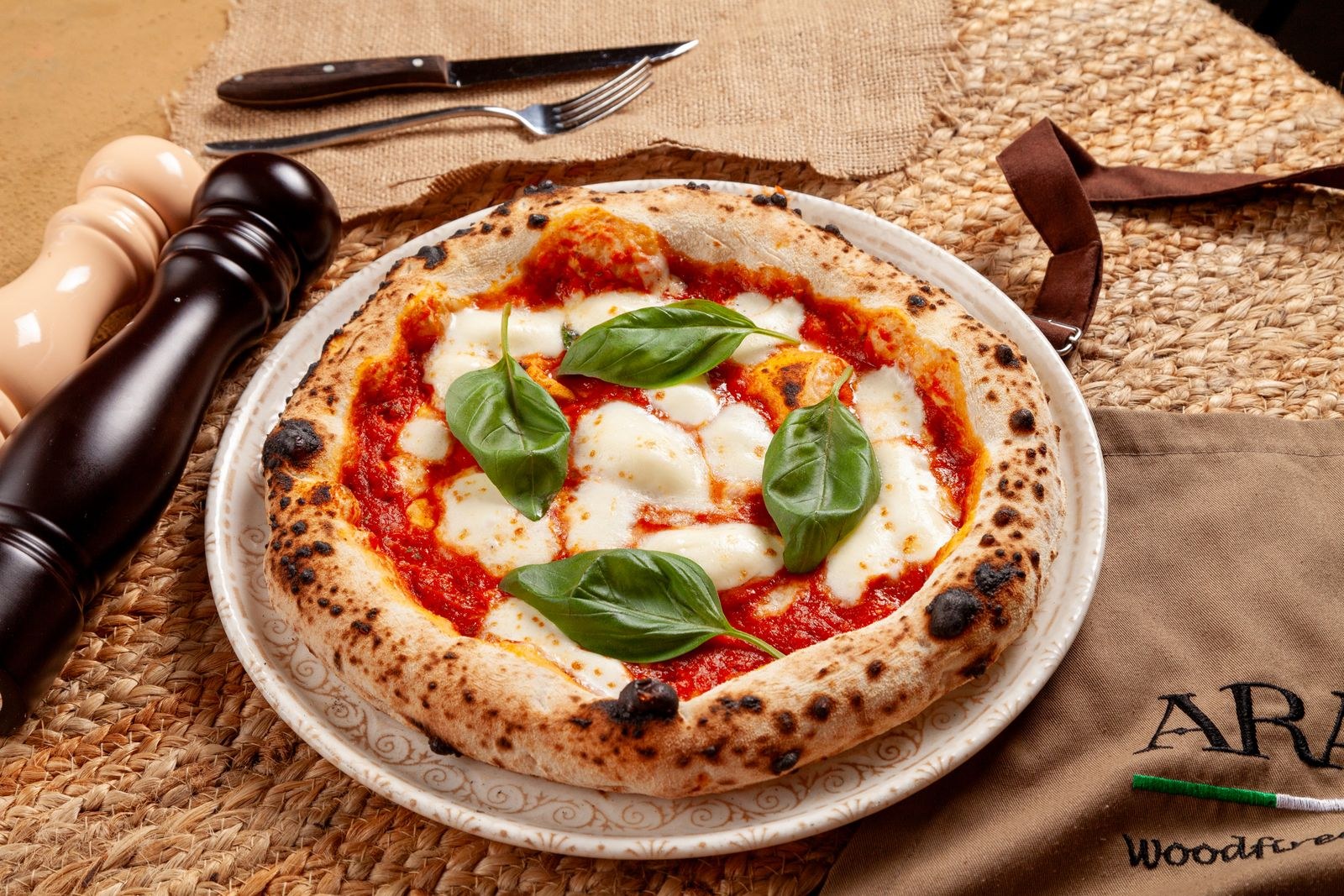 Neapolitan margherita with a blistered crust, mozzarella and fresh basil
