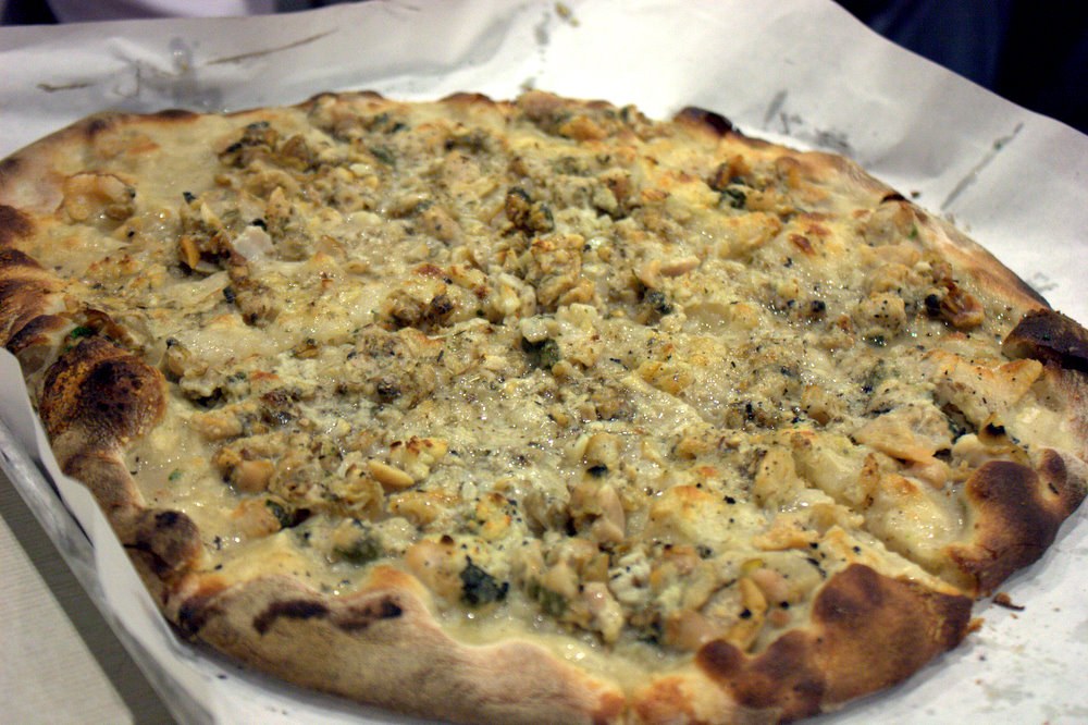 Pizza styles: New Haven white clam pizza with a charred thin crust